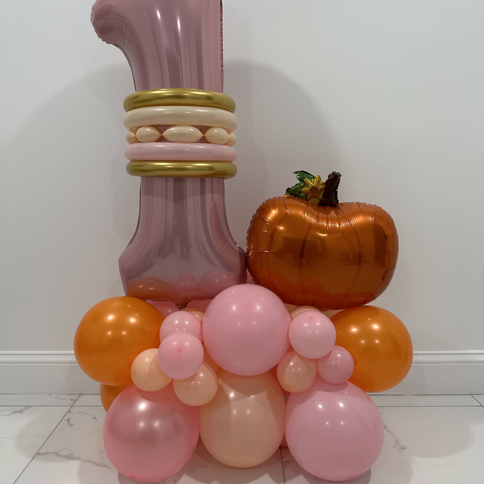 Standing balloon decor with party theme