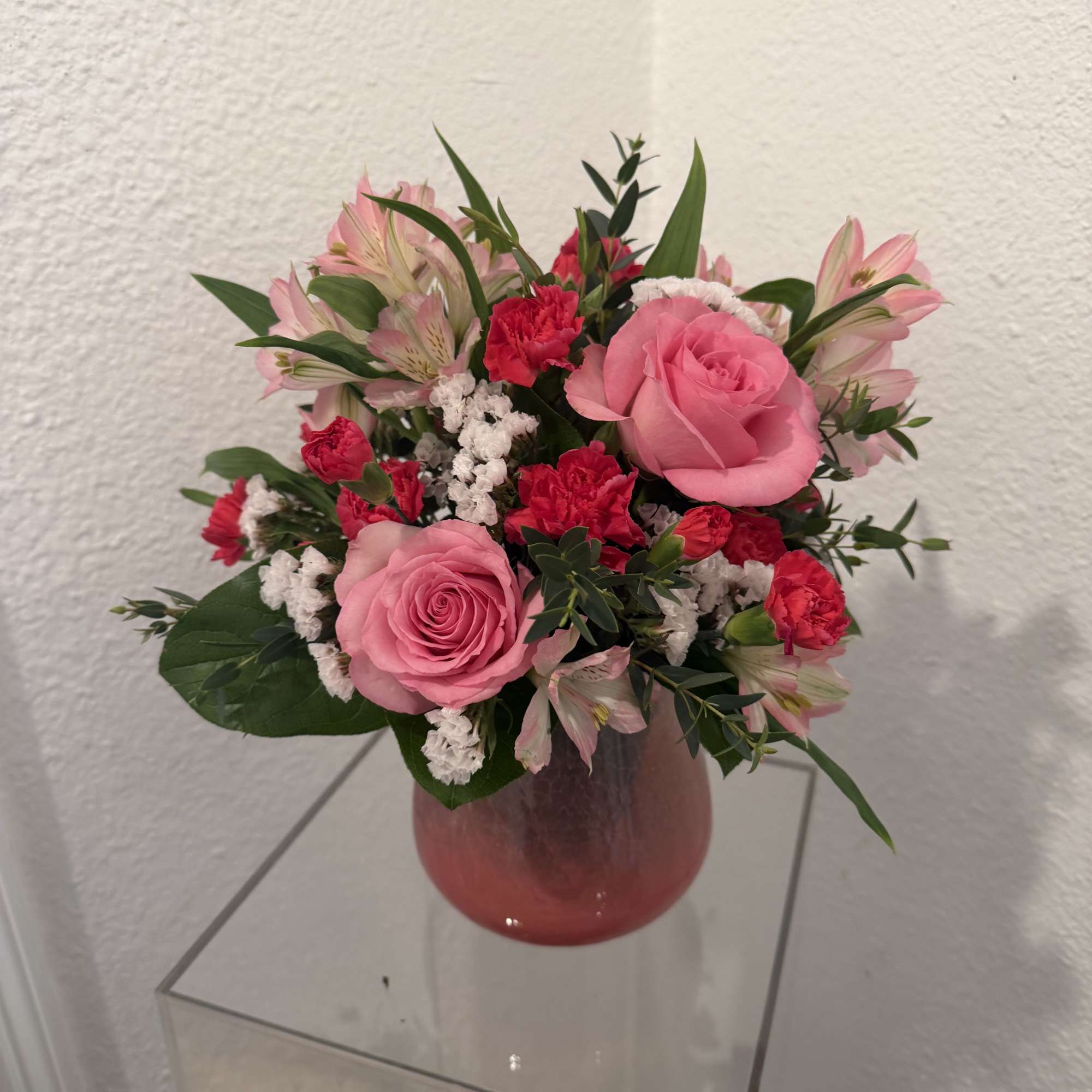 Radiating soft sophistication, the Sweet On Hue Bouquet blends pink roses, alstroemeria