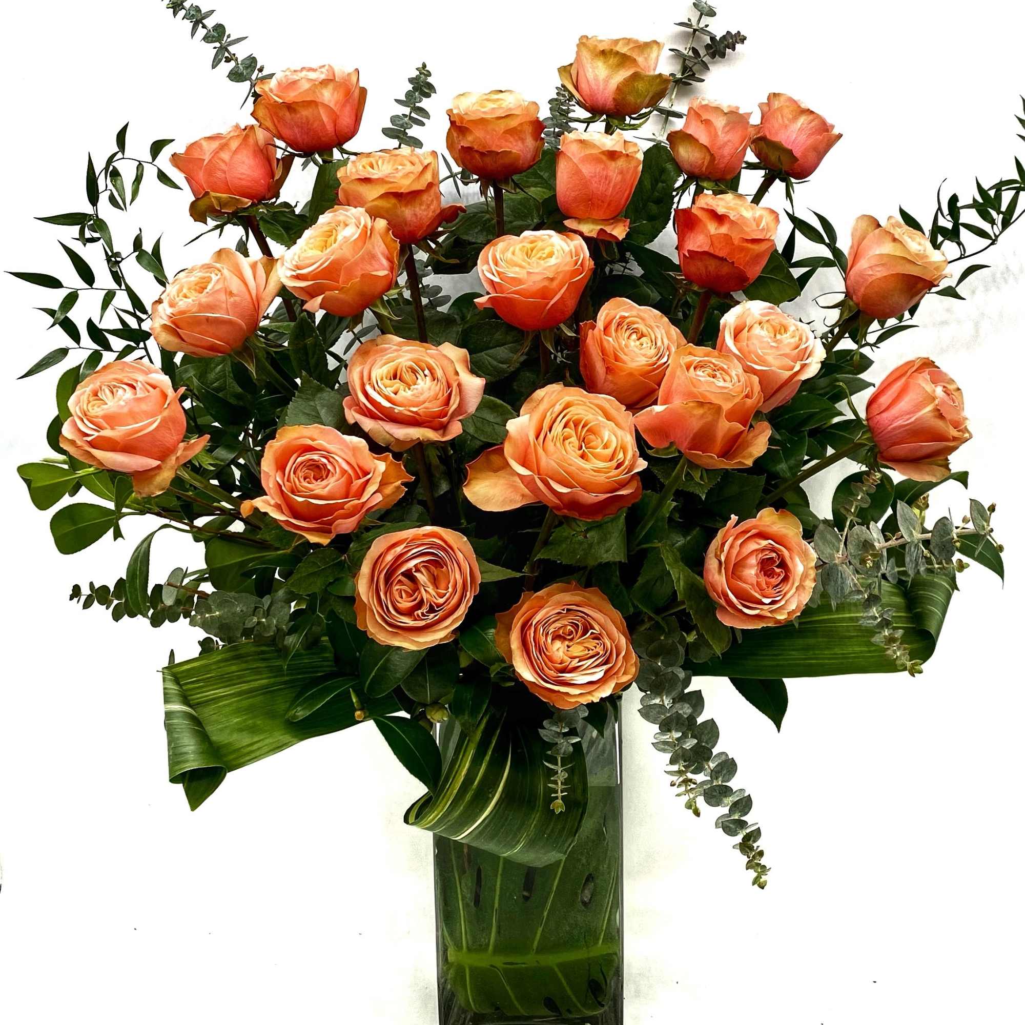 Our take on a classic arrangement of beautiful premium Peach Roses. Our