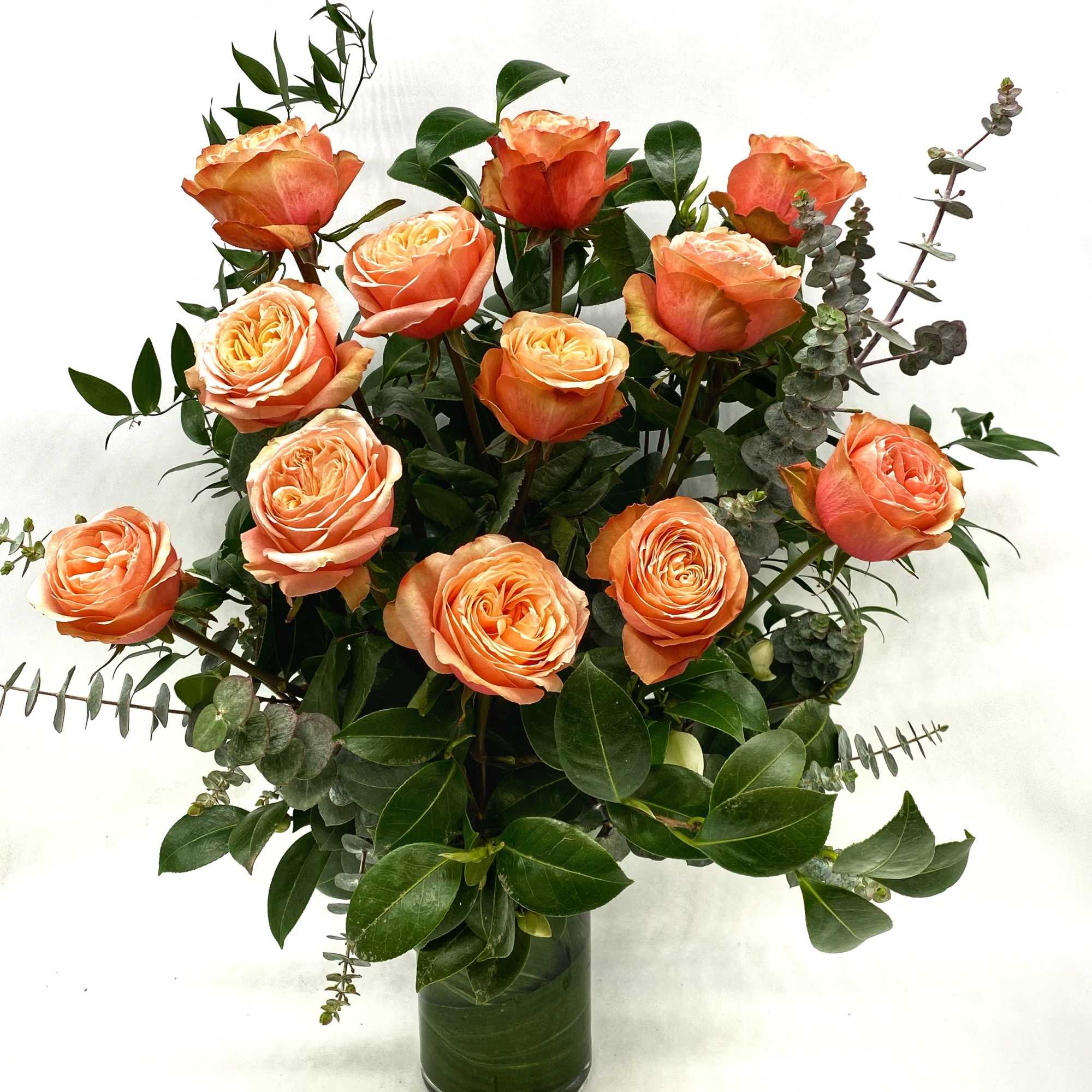 Our take on a classic arrangement of beautiful premium Peach Roses. Our