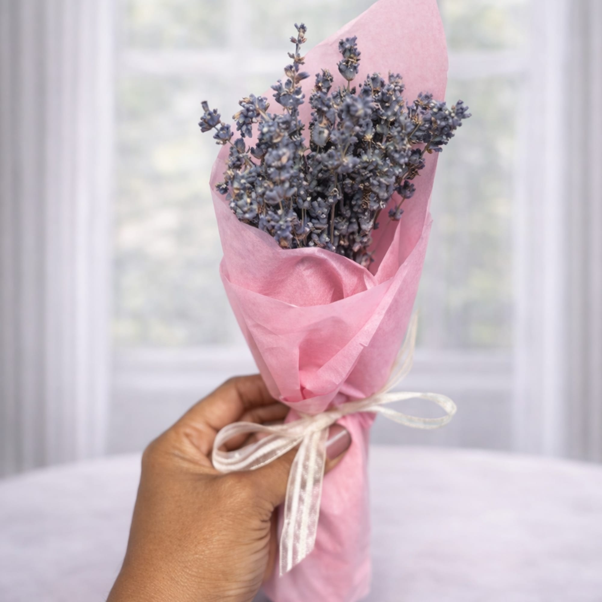 Delicate, calming, and beautifully wrapped, our Petite Lavender Posy is a mini