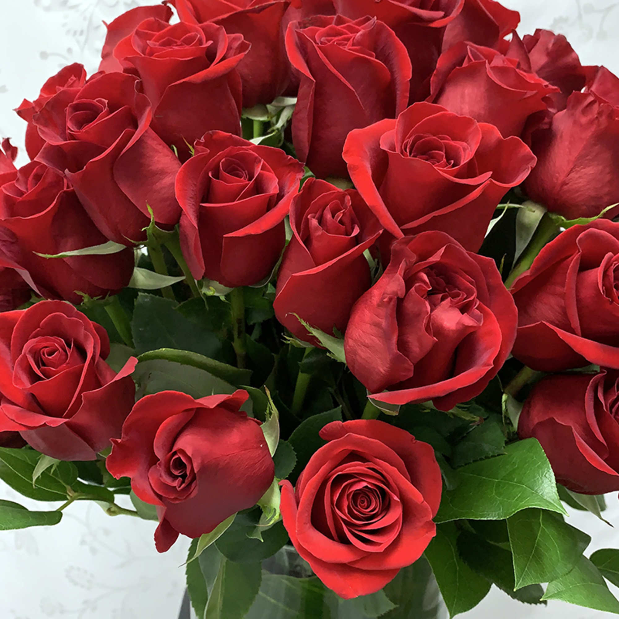 You choose, we create! 
By selecting the number of red roses, our