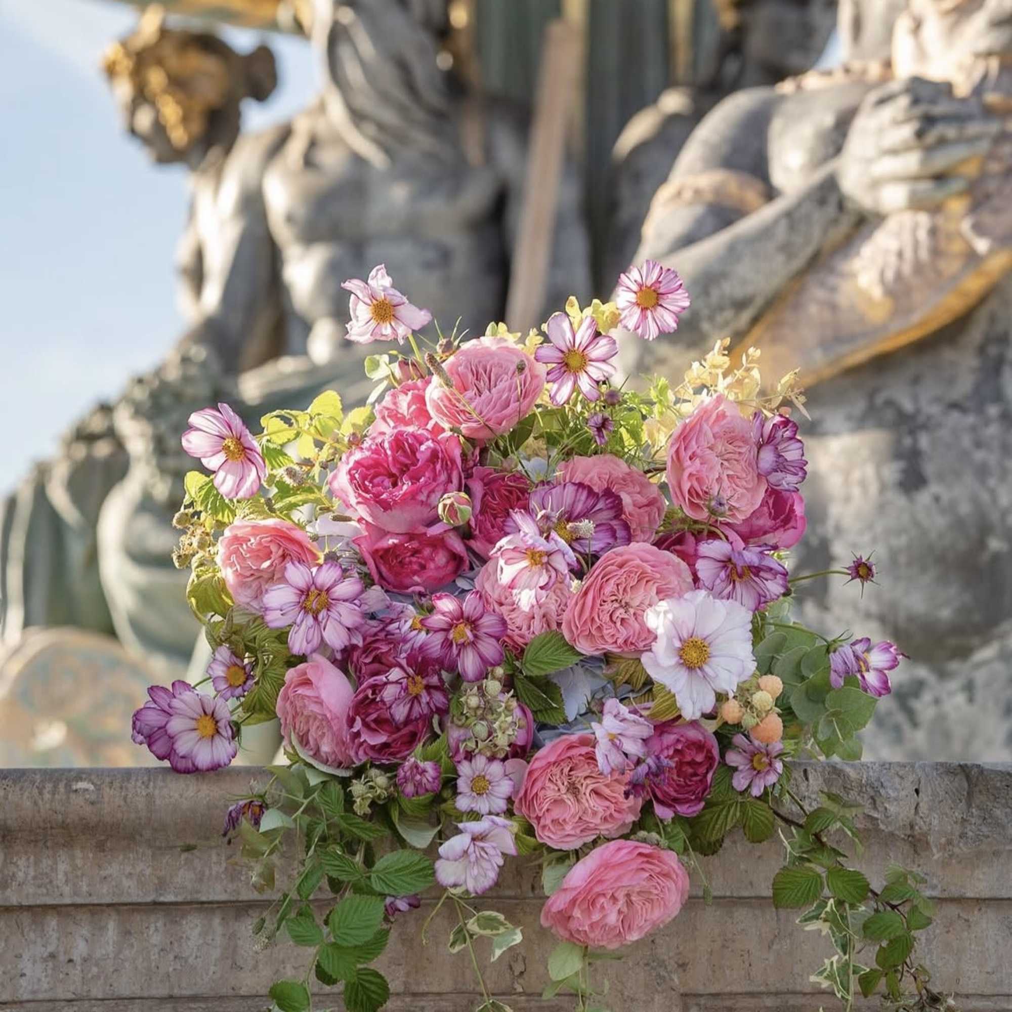 This romantic Parisian style arrangement boasts an abundance of natural gentle blooms