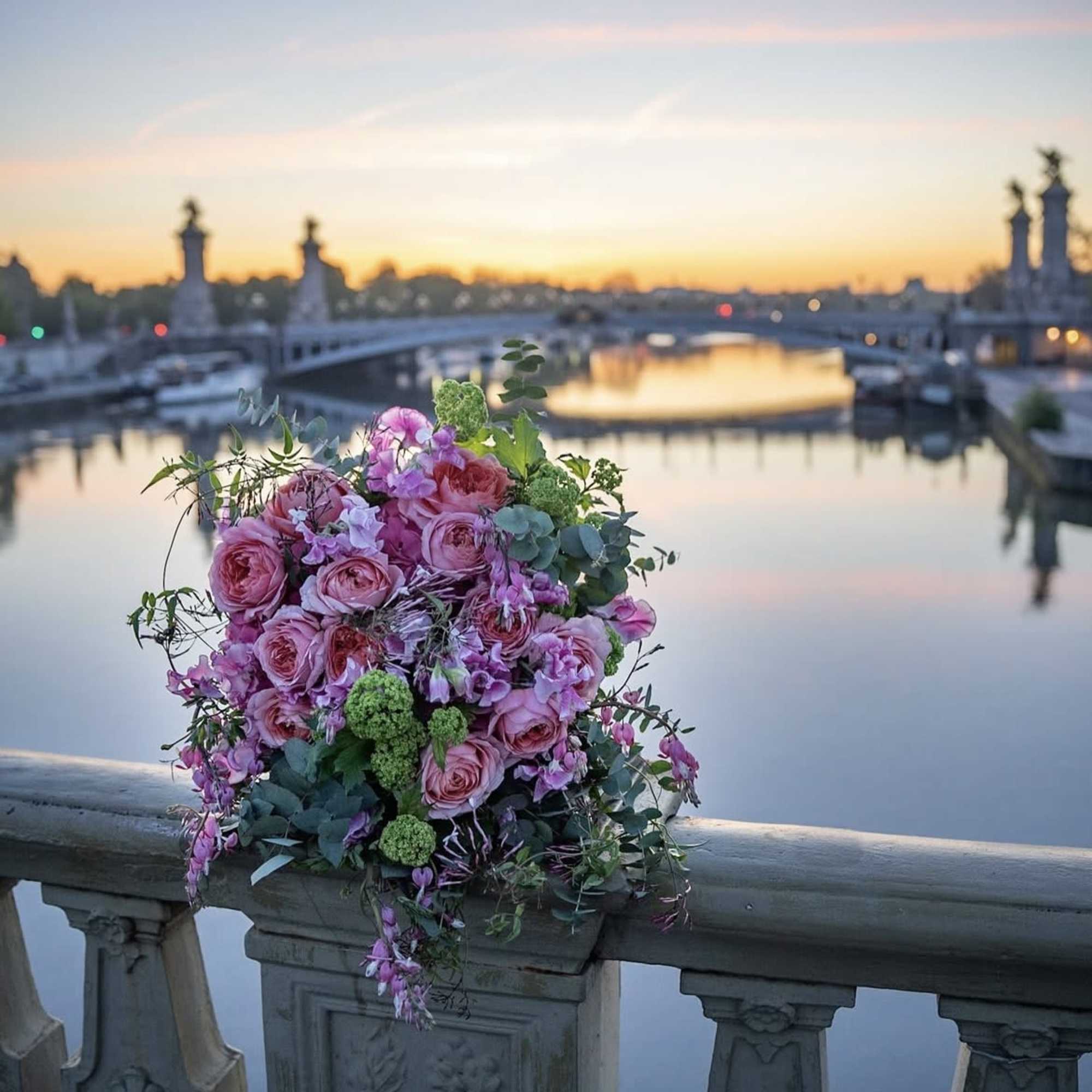 This romantic Parisian style arrangement boasts an abundance of natural gentle blooms