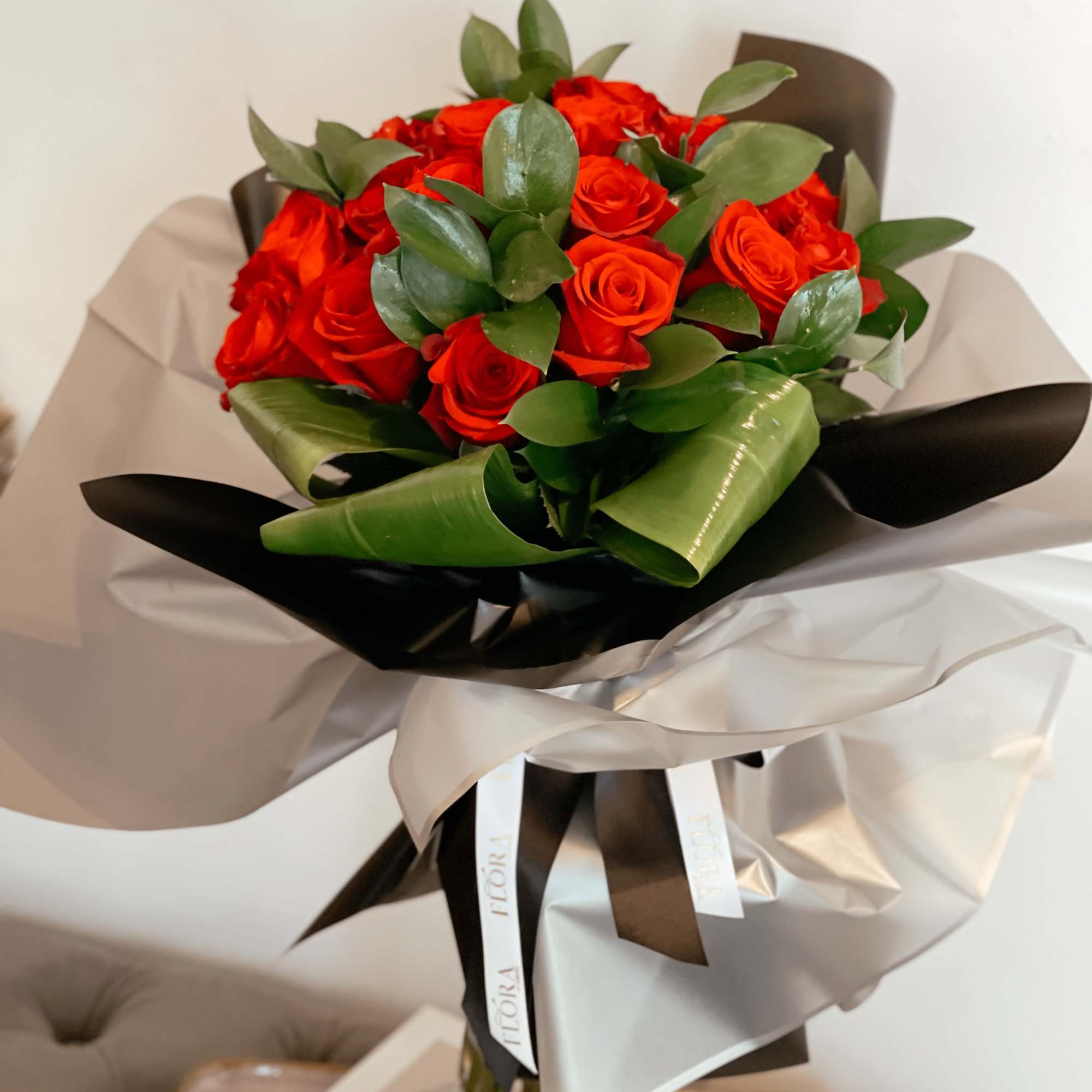Elegantly arranged 25 rose bouquet, perfect for any occasion. Whether for a