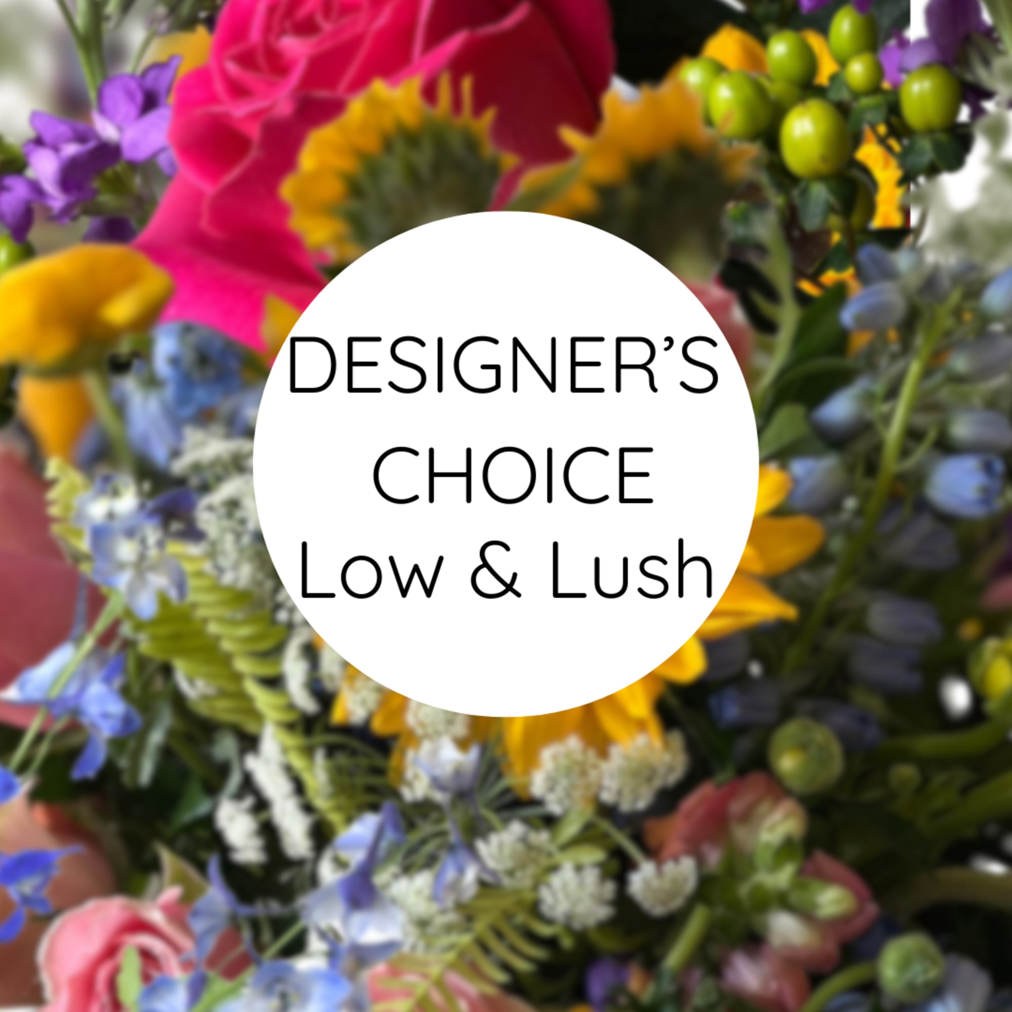 Trust our designers to create a beautiful, low and lush arrangement for