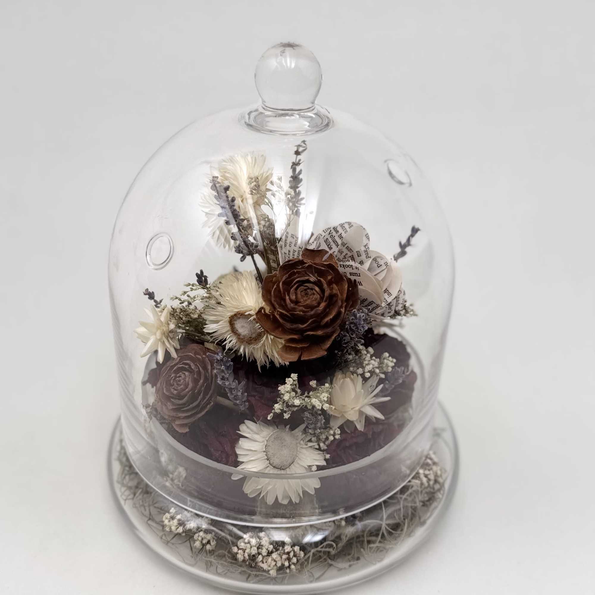 Our Forever Terrariums are made with dried flowers and natural materials. A