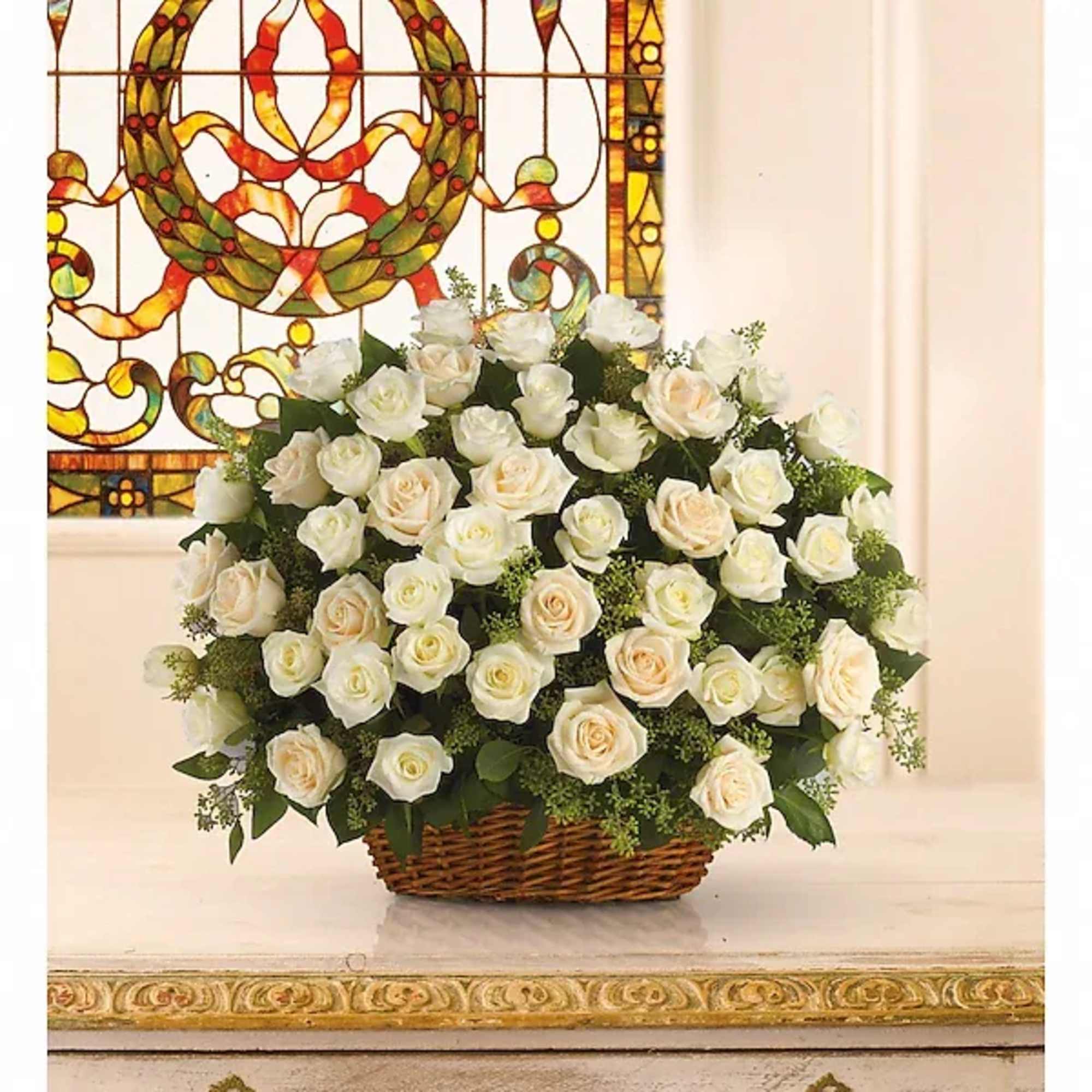 A beautiful, bountiful basket of luminous white roses that feels so fresh
