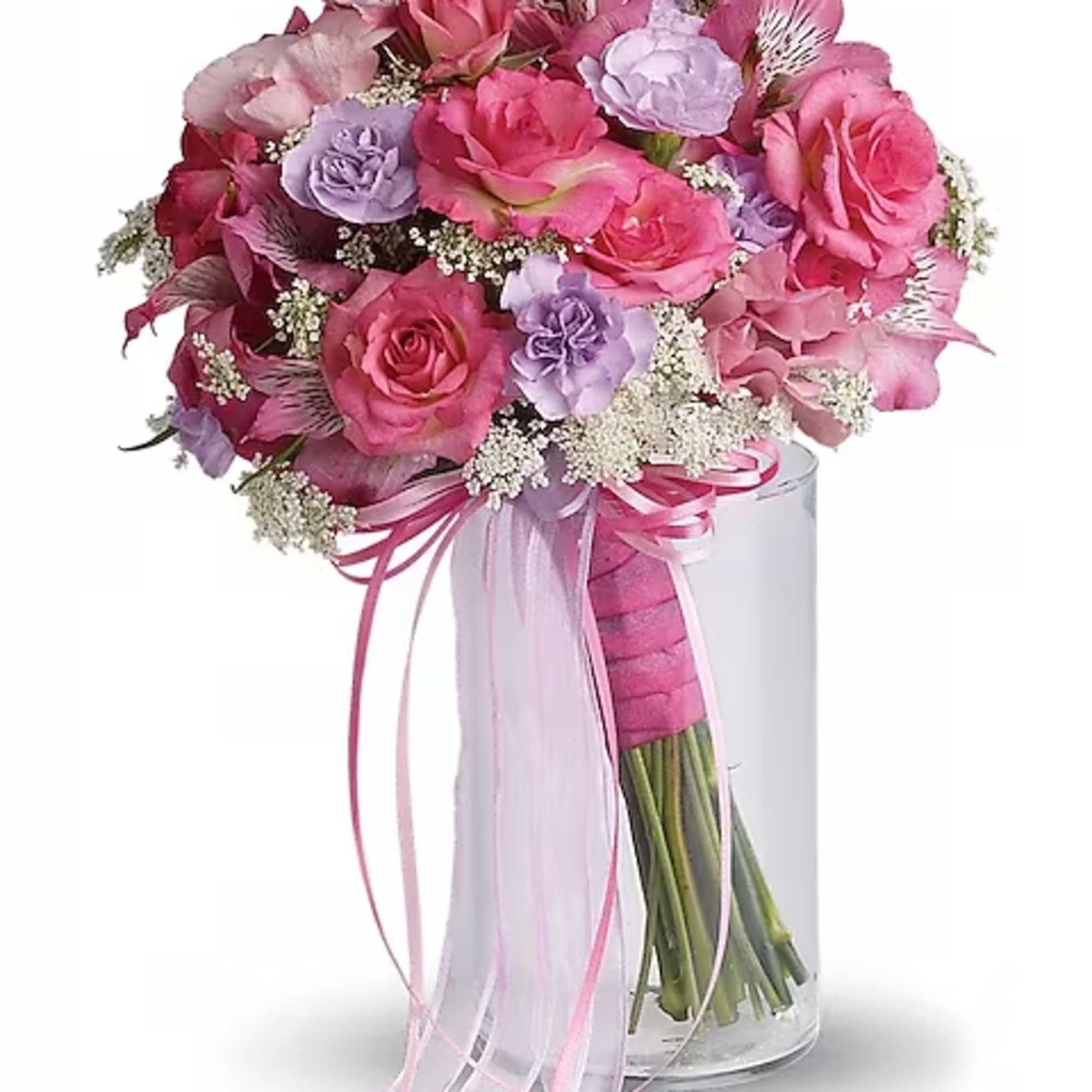 This petite pink and lavender bouquet was made by magical fairies especially