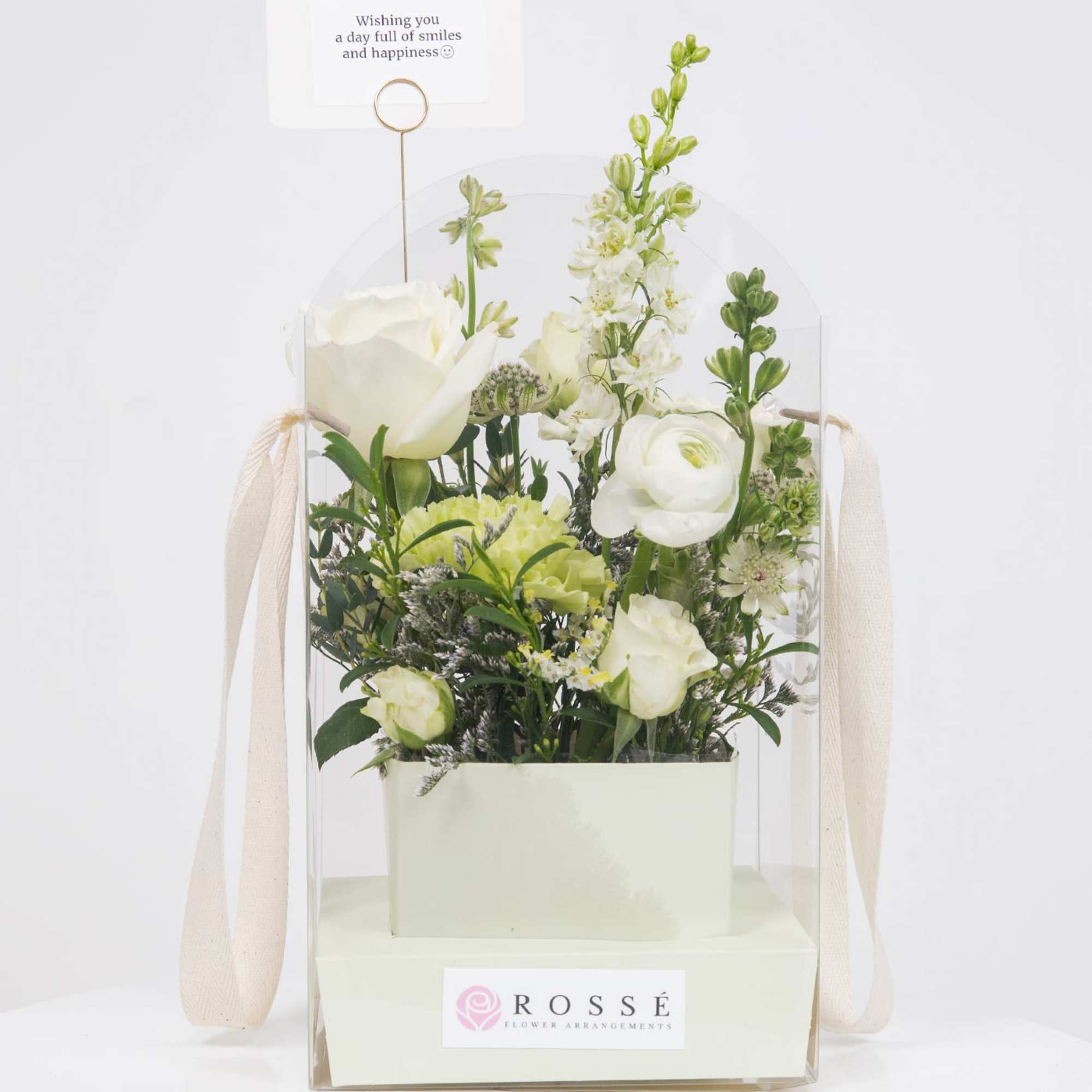 A Flowers bag featuring a soft pastel-colored box paired with an arched