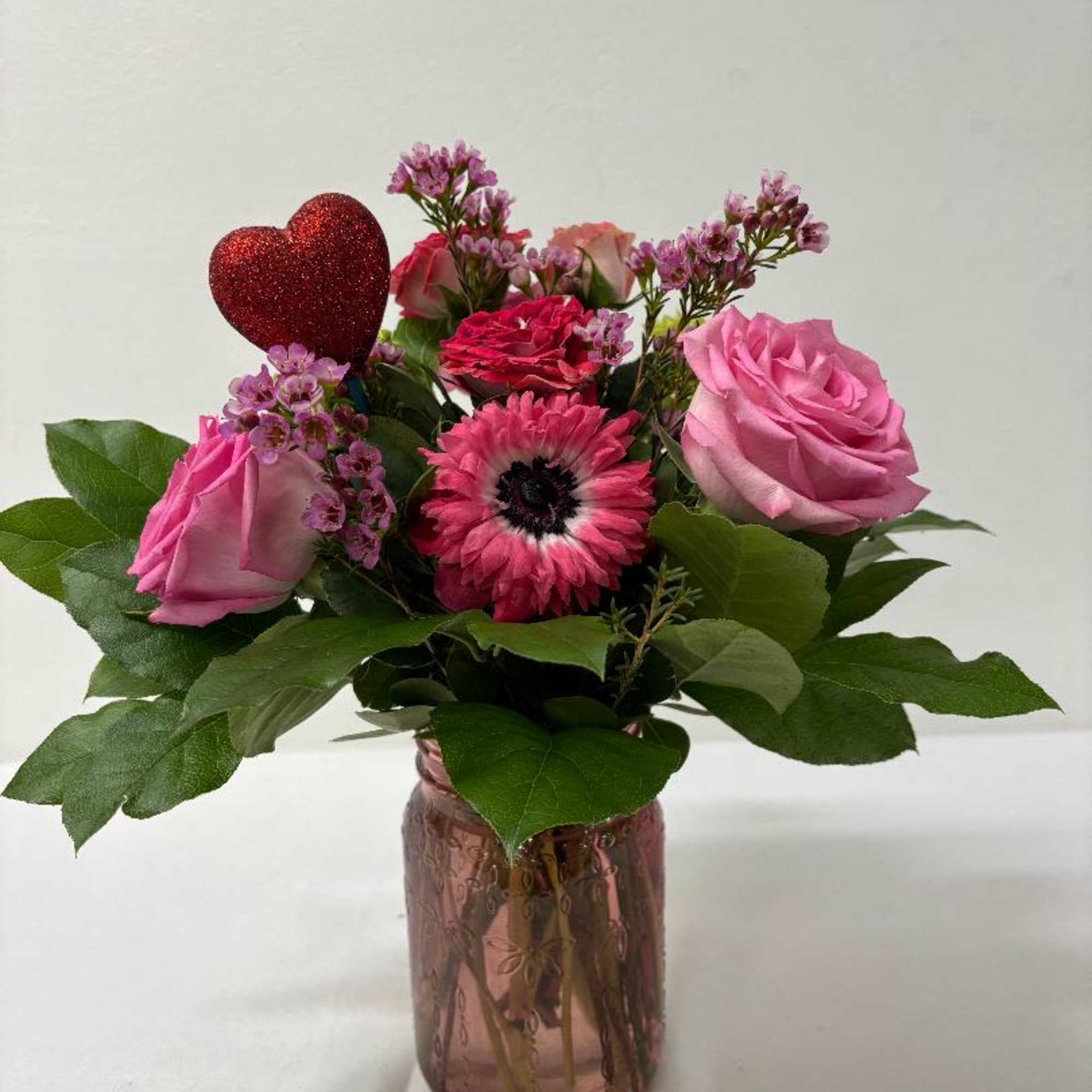 Charming Arrangement with green Hydrangea, green Spider Mums, Roses, Orchids, Anemones and