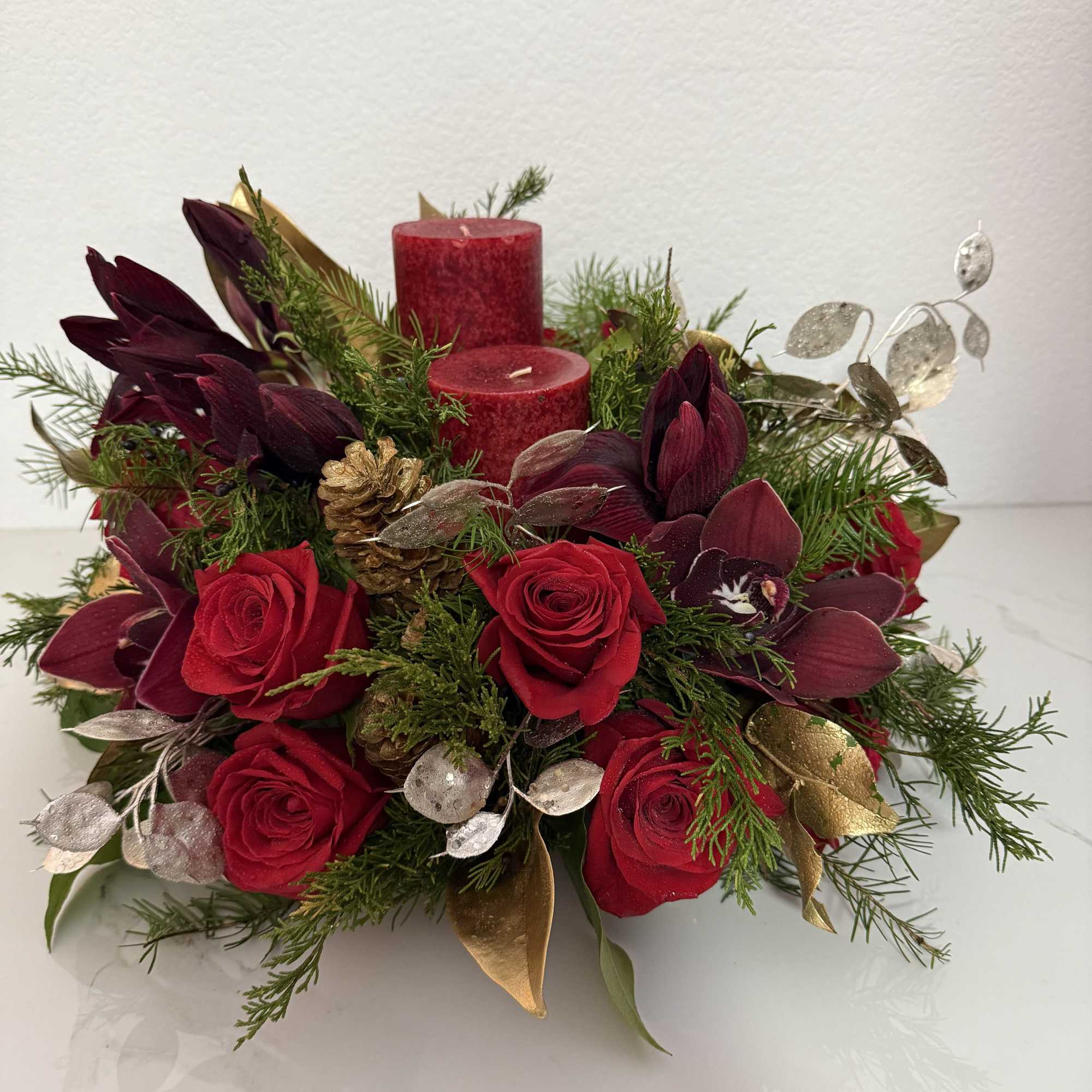 Beautiful Christmas centerpiece with candles