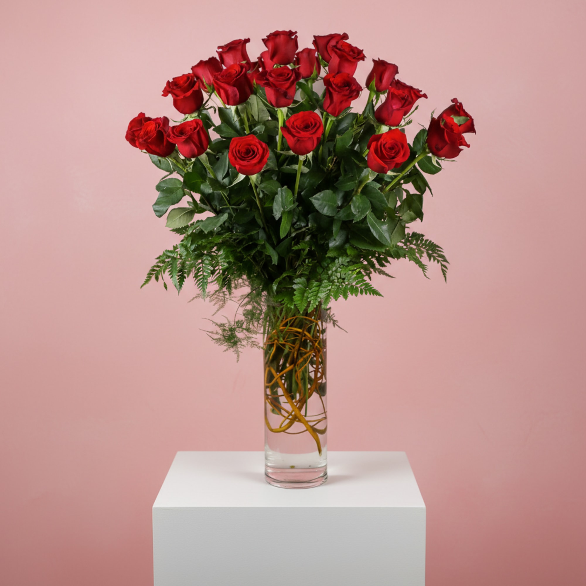 Designed to make a lasting impression, this romantic arrangement showcases premium red