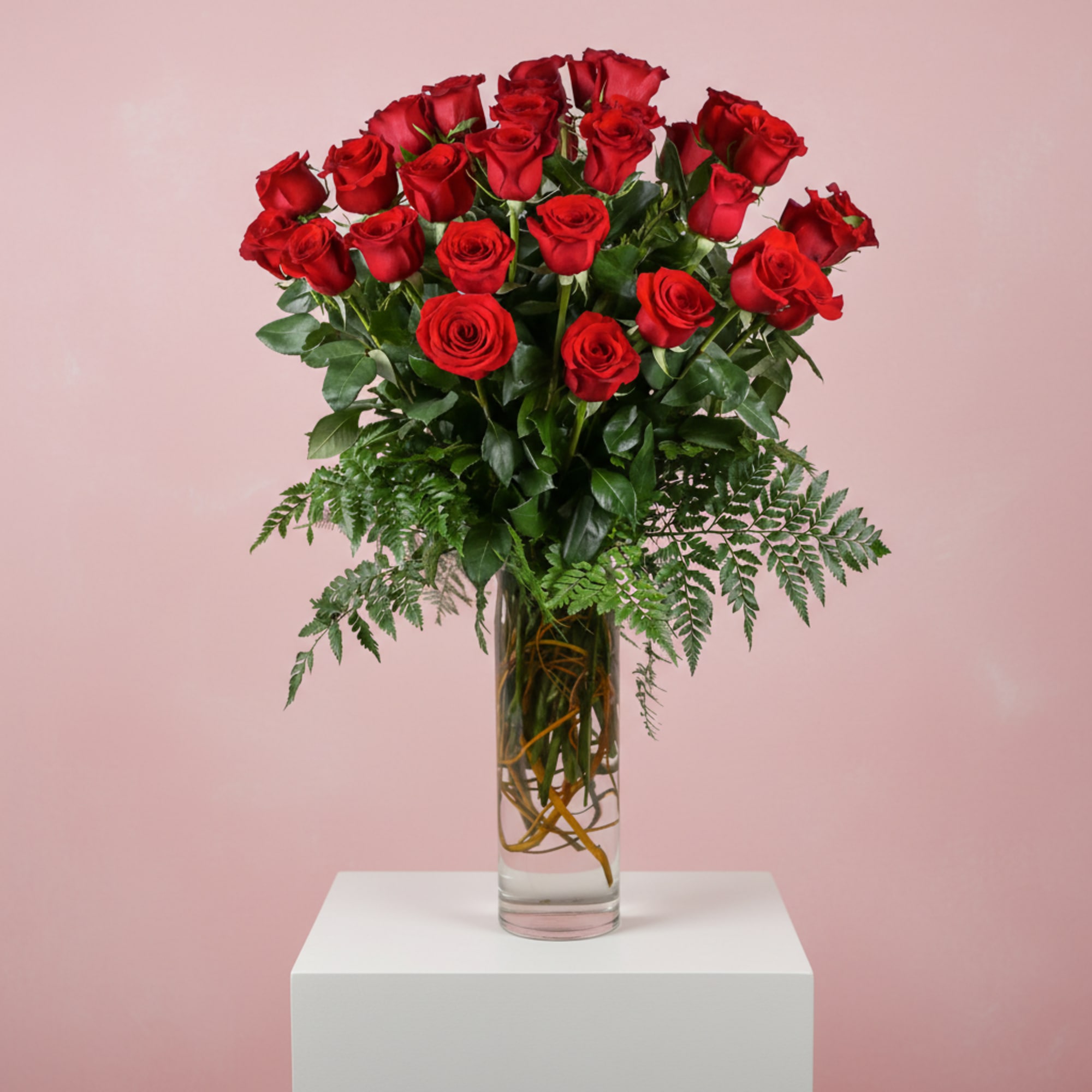 Designed to make a lasting impression, this romantic arrangement showcases premium red