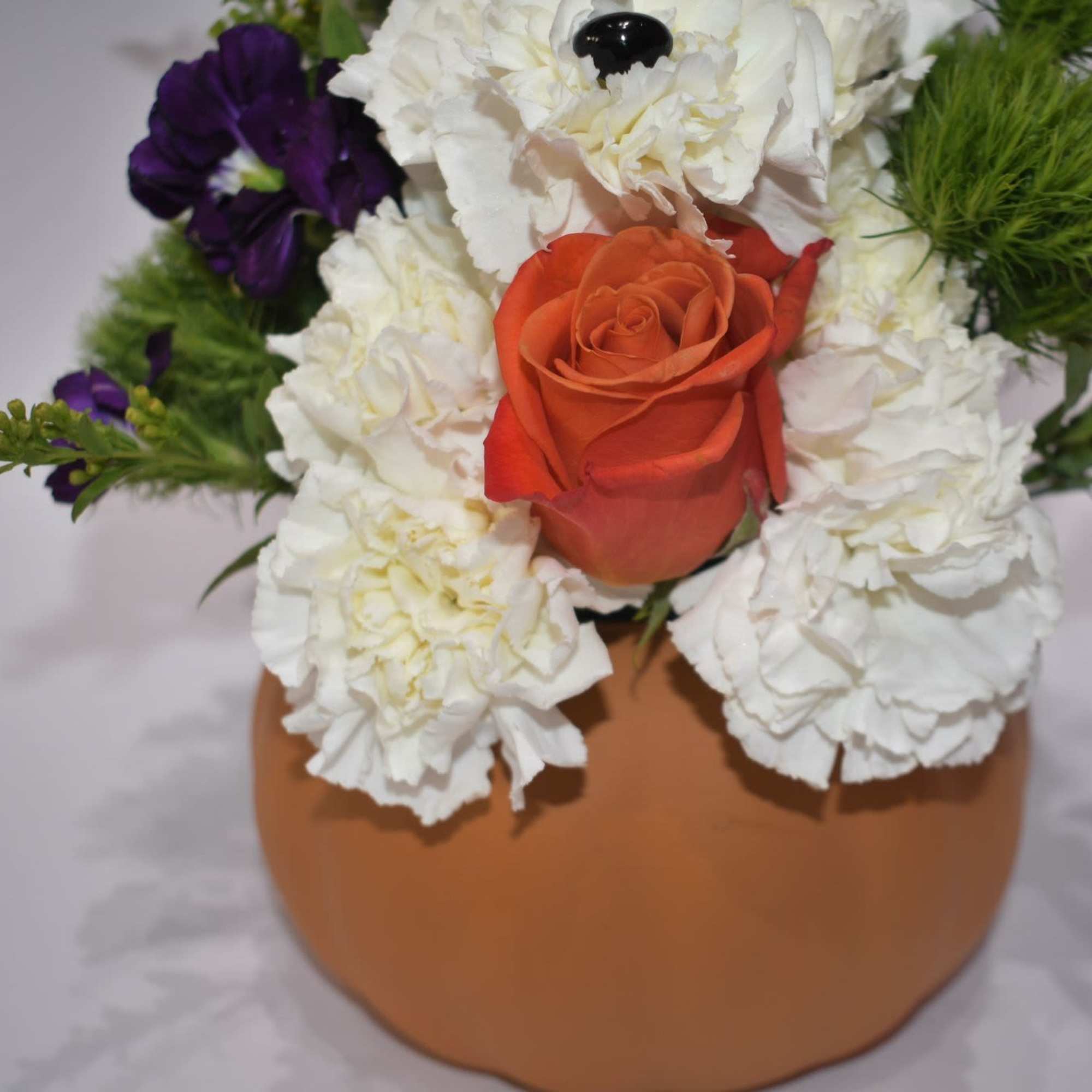 EXCLUSIVE Our fall flower pup is a true delight. Crafted from white