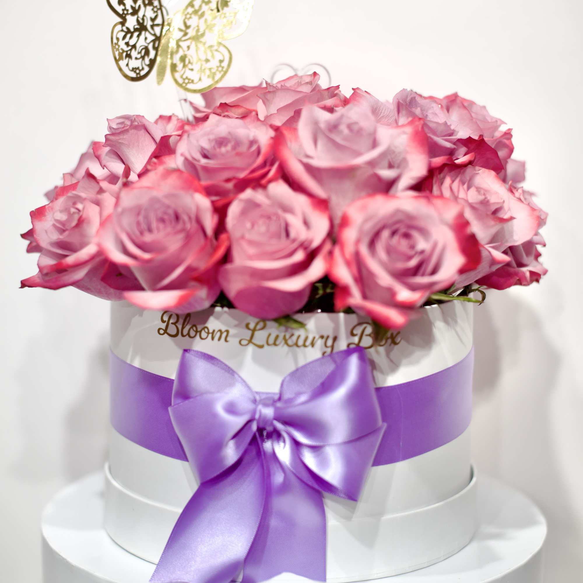 Our the lux MDC round box pink arrangement available in 2 sizes