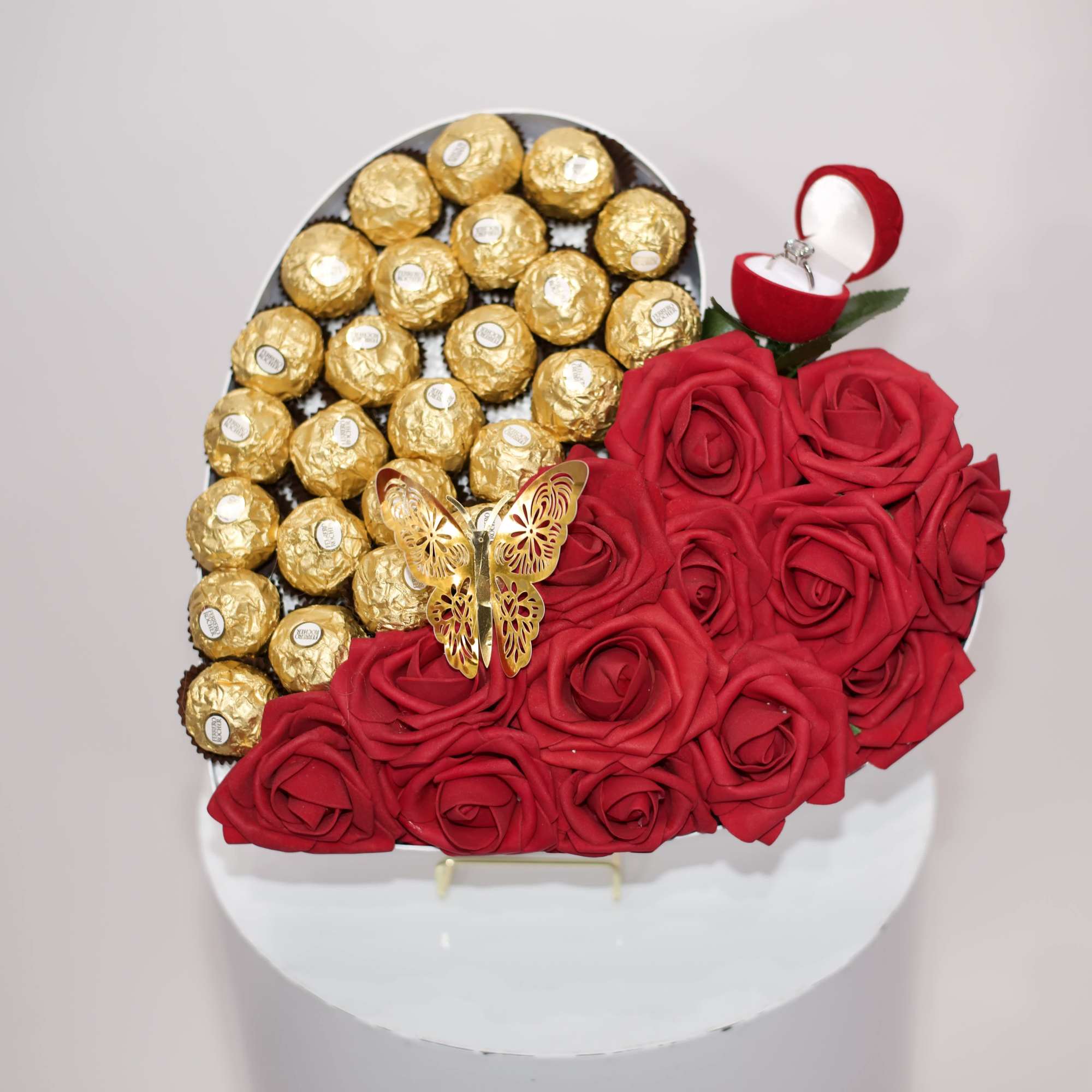 Our heart natural roses and chocolate arrangement with 1 rose ring holder