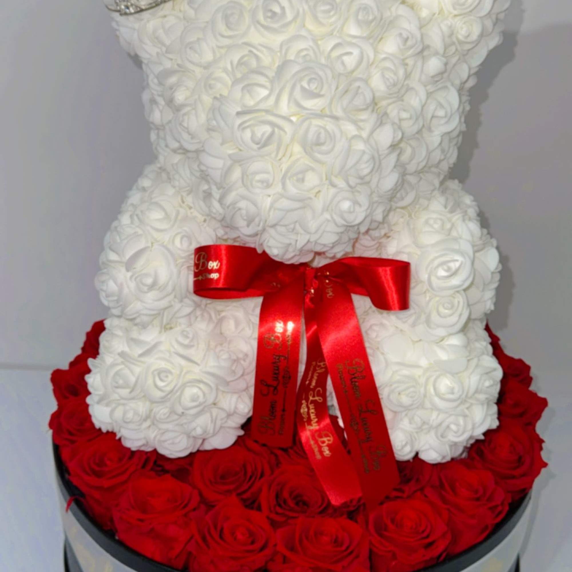 4 dozen red roses 
Large bear
Bow
Crown 