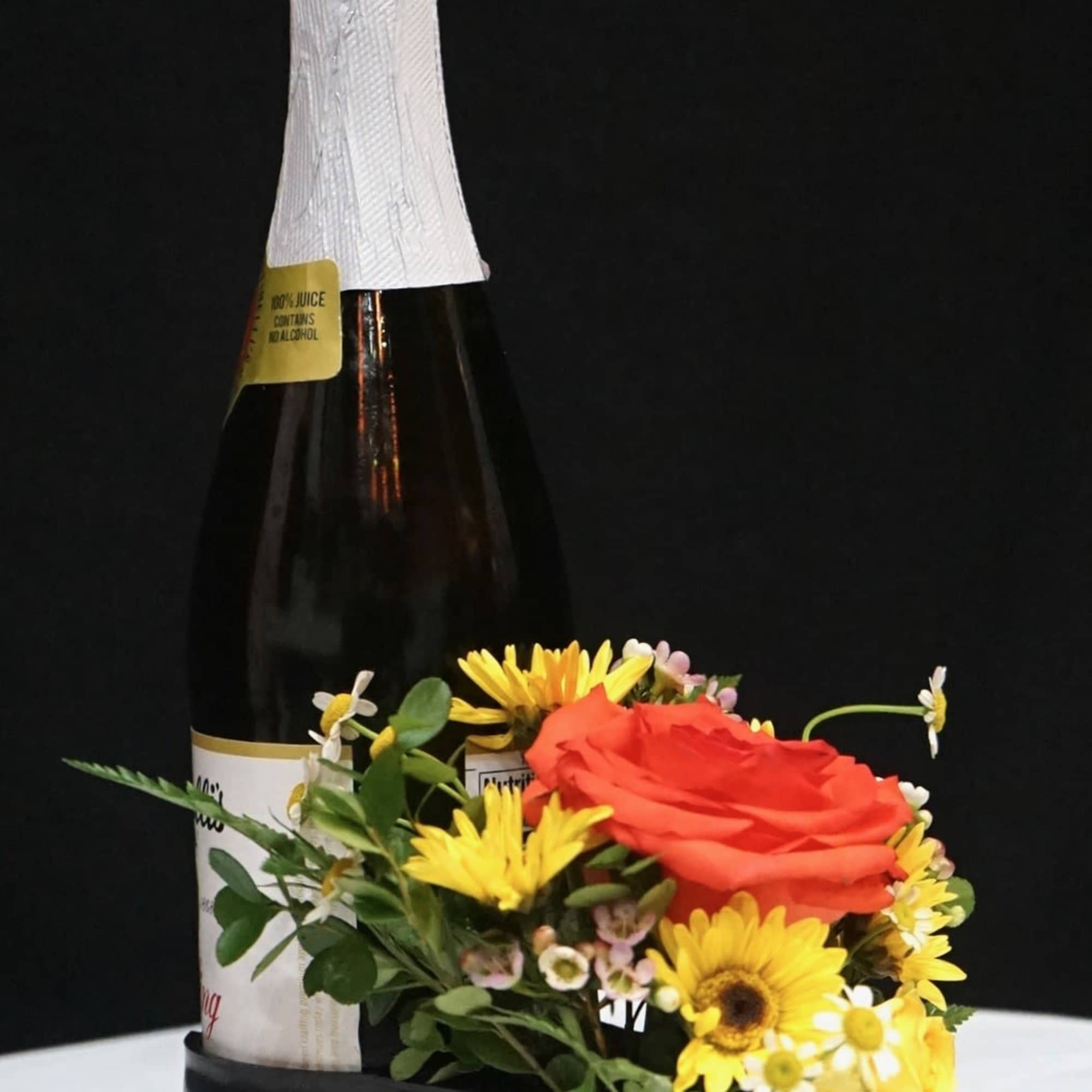 Have a special occasion? Celebrate with this gorgeous petite arrangement which includes