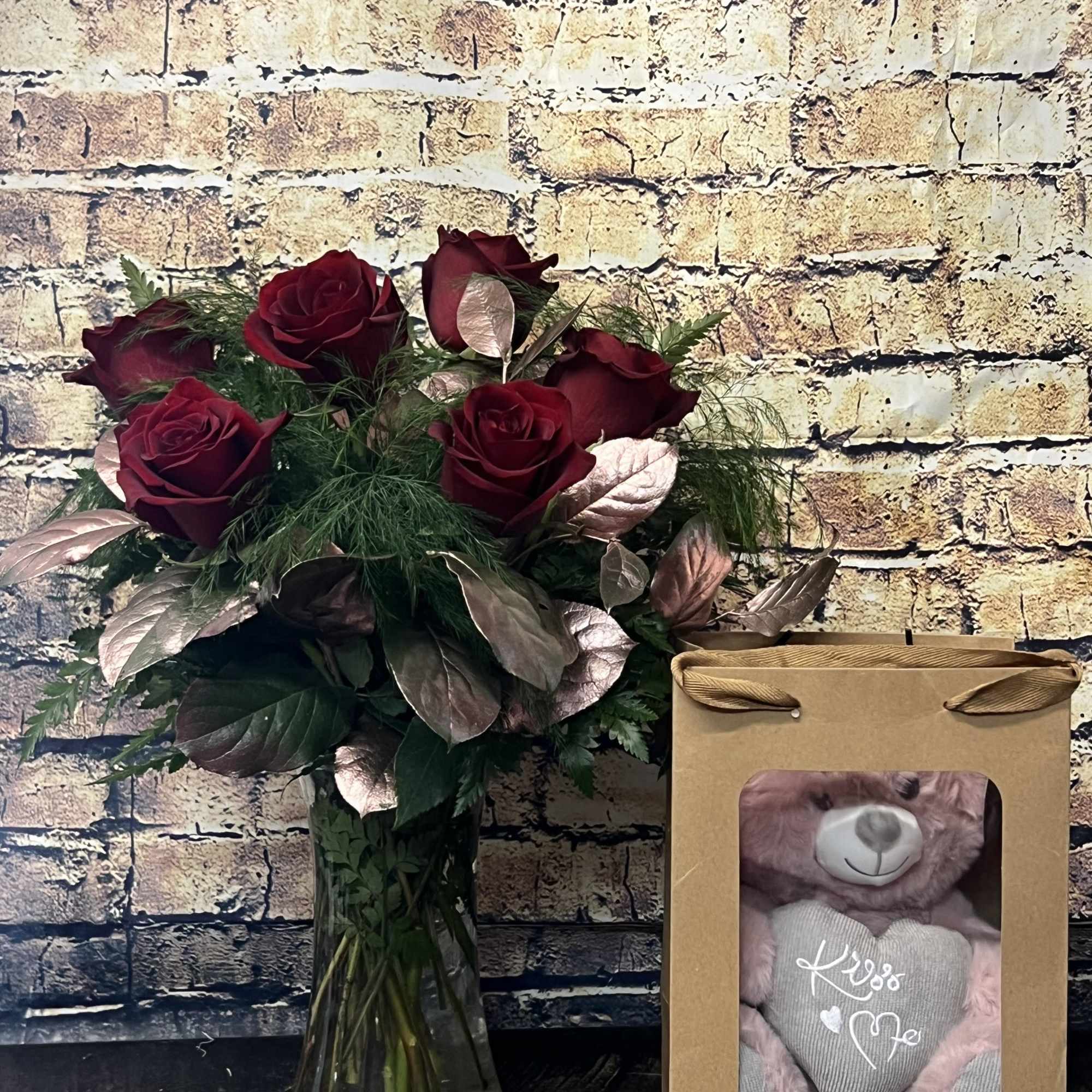 Nothing is more stunning than a classic red rose accented with Rose