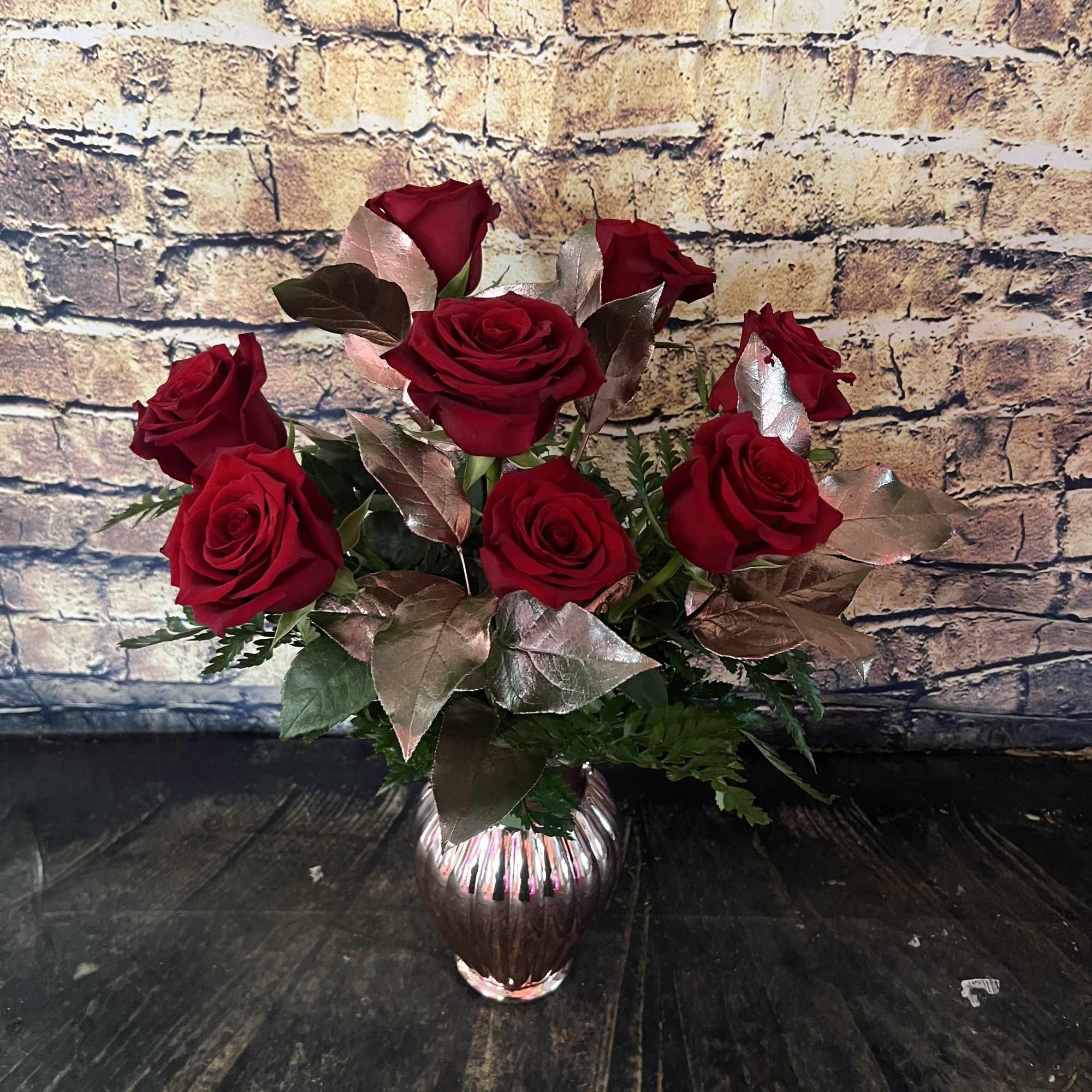 Nothing is more stunning than a classic red rose accented with Rose