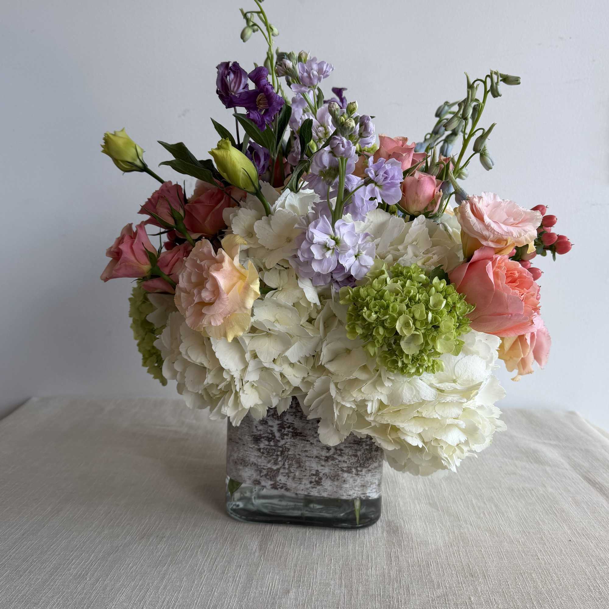 garden roses, clematis, delphinium, Hypericum, Hydrangea, lavender stock