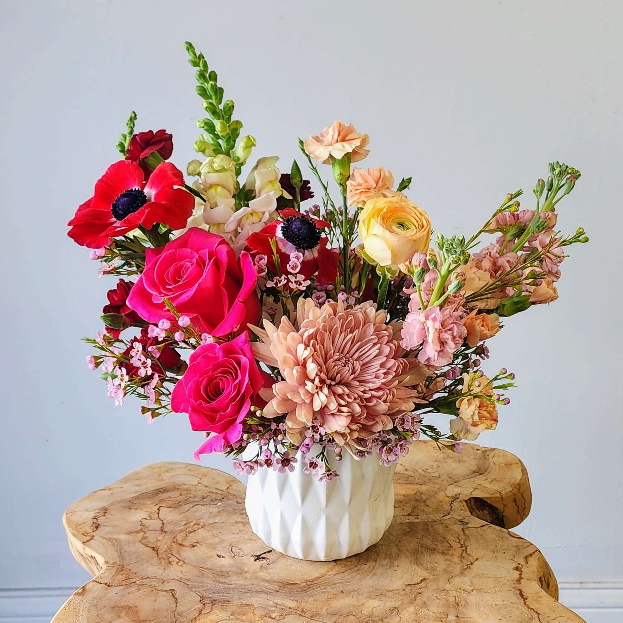 Explore timeless elegance with our Sweetheart's Bloom Ceramic Arrangement, the perfect gift