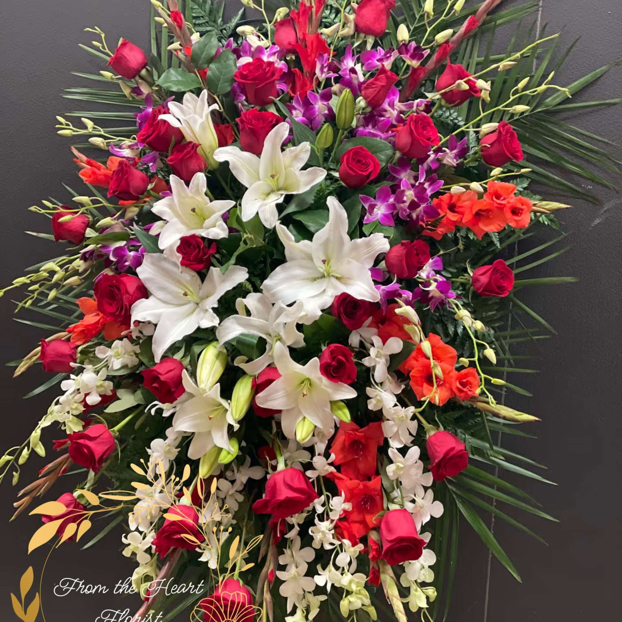 This Grand and Beautiful standing spray, made with purple and white dendrobium