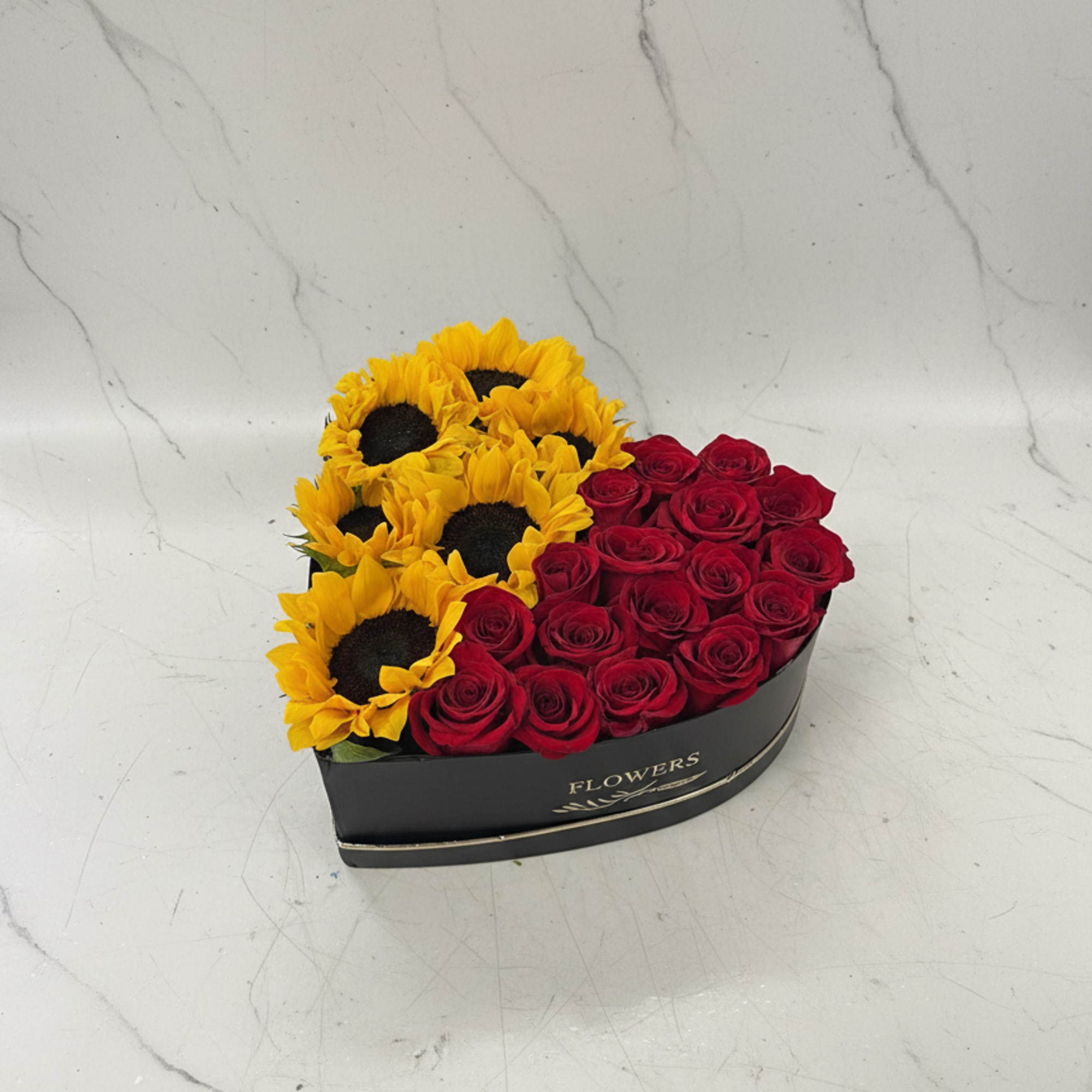 A heart-shaped box featuring a half-and-half design of classic red roses and