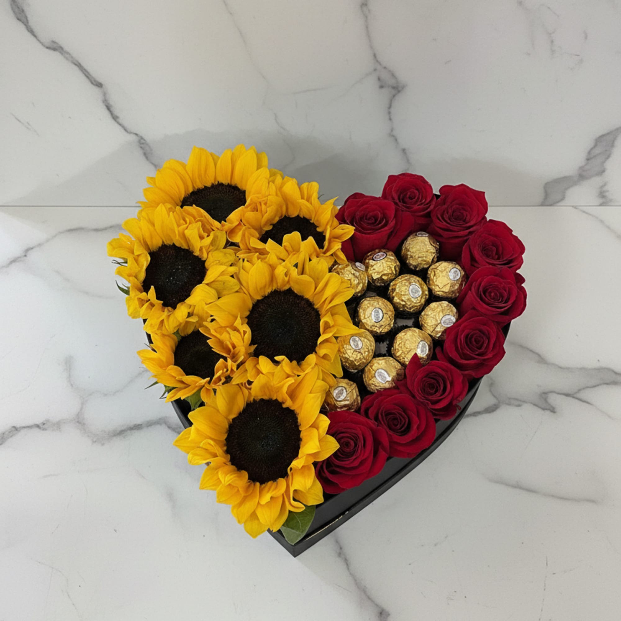 Our Sunny Choco Heart Box is a unique Valentine&rsquo;s arrangement that blends