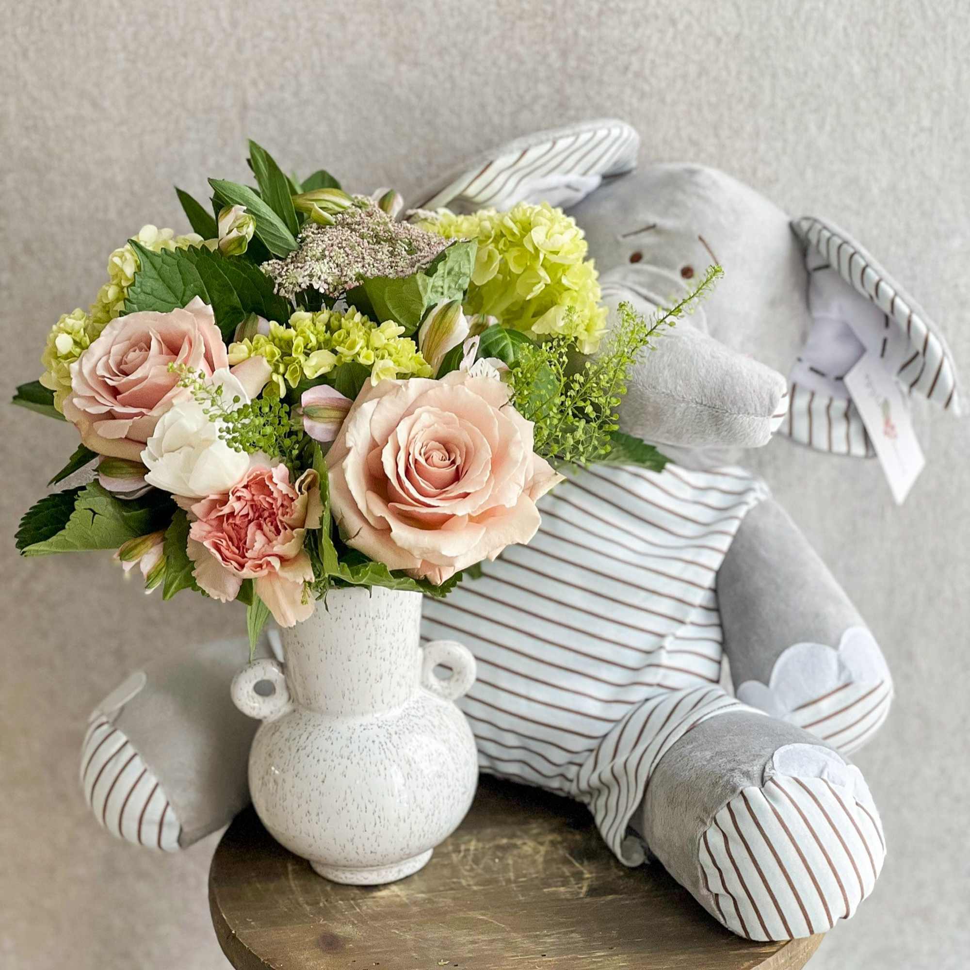 Floral Arrangement paired with an 18" Elephant Plush 