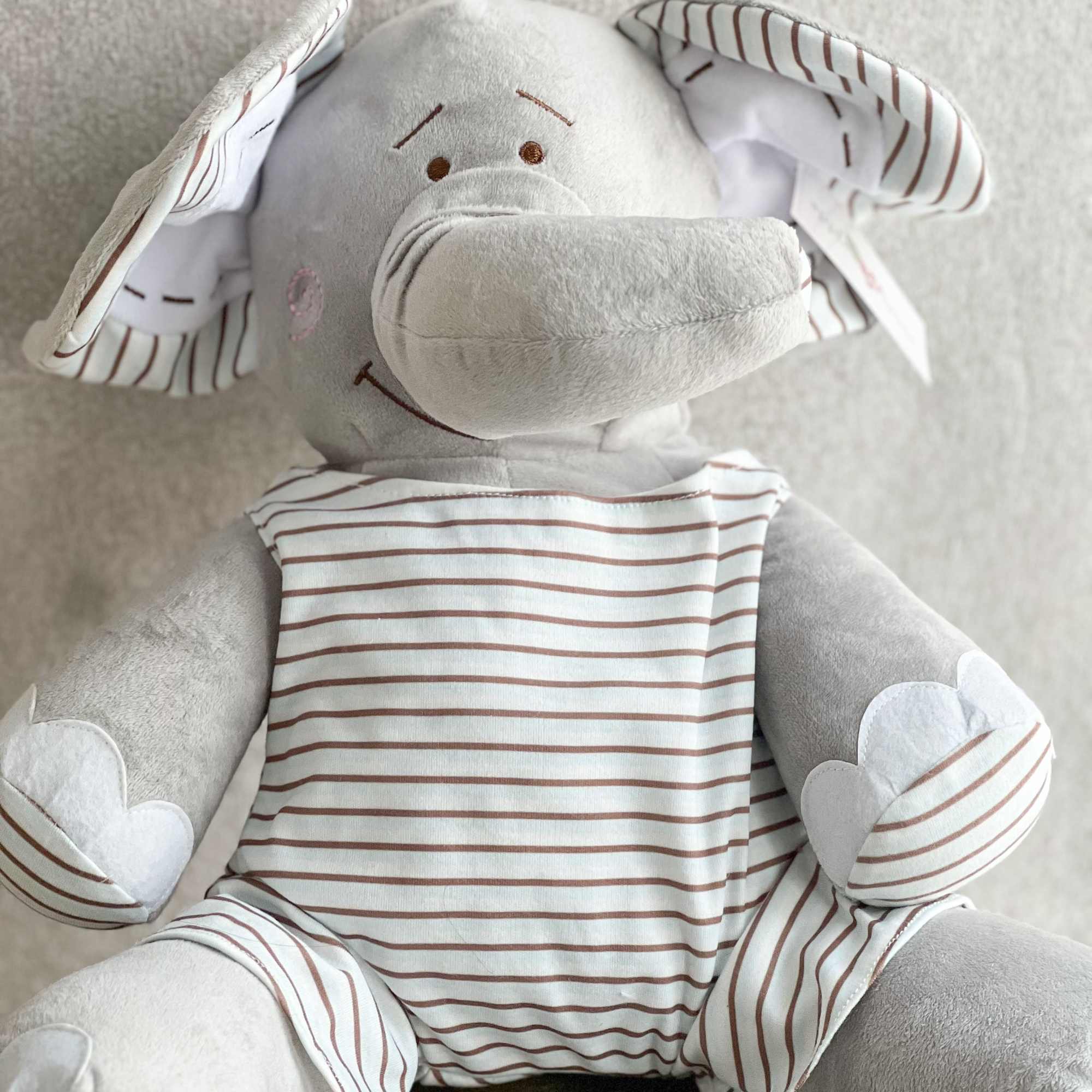 Floral Arrangement paired with an 18" Elephant Plush 