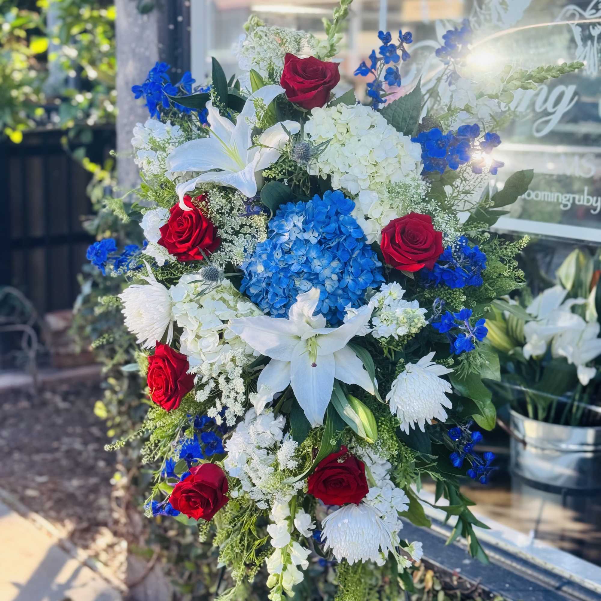 a colorful selection of seasonal blooms to celebrate the life of a