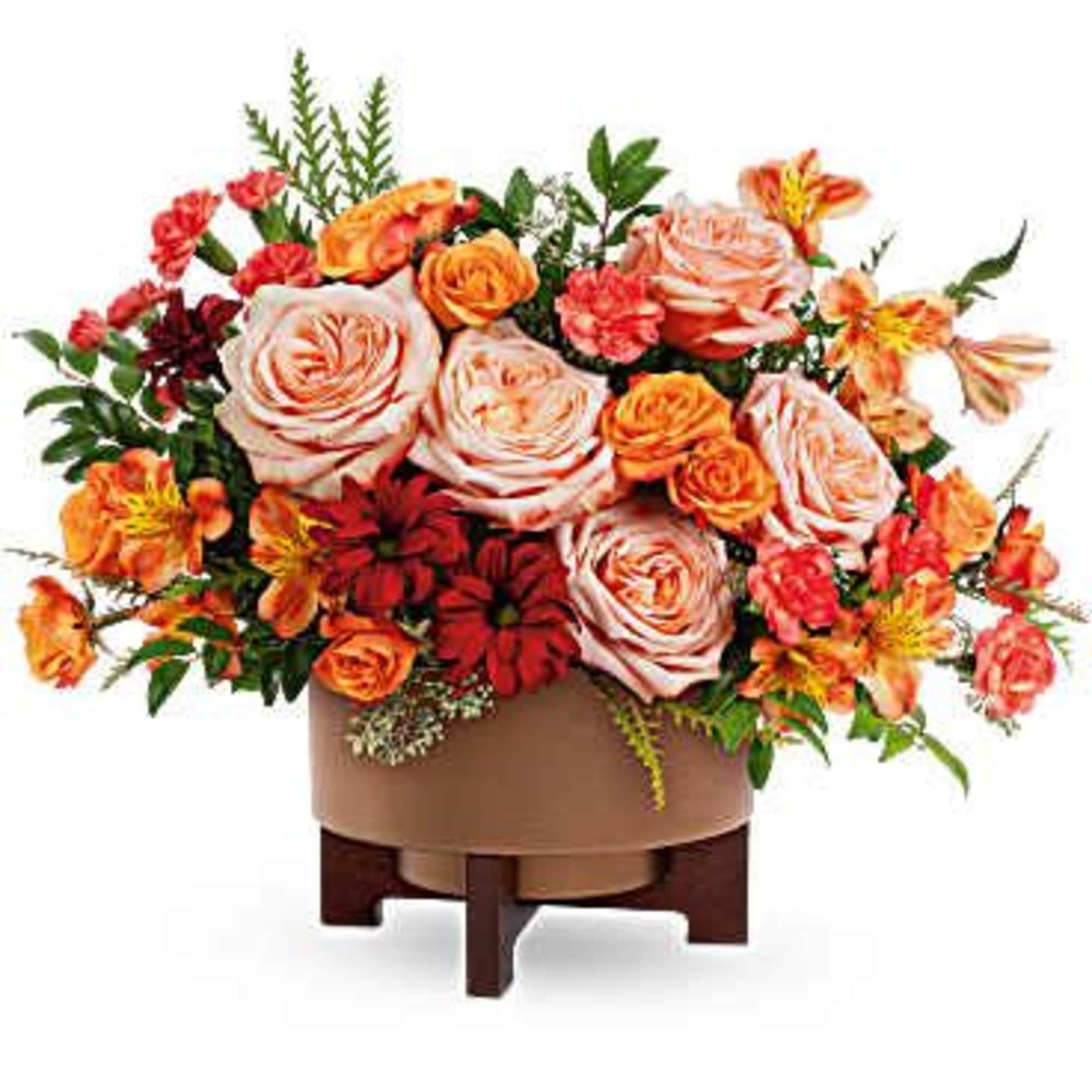 Celebrate the season with warmth and charm. The Copper Celebration Centerpiece captures