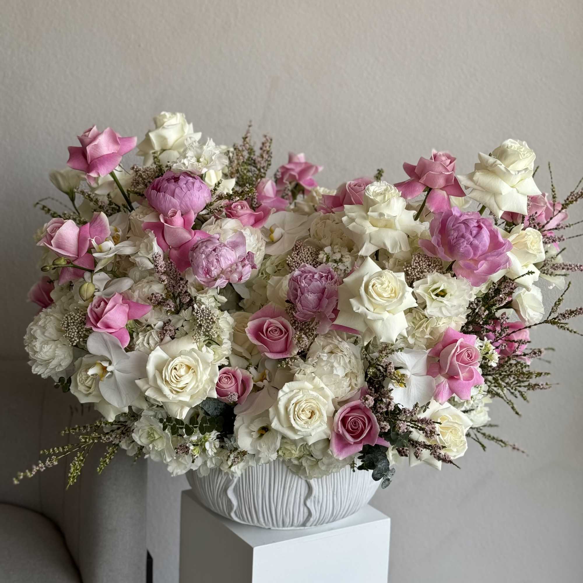 An opulent showcase of elegance, the Grand Pink Rose Symphony is a