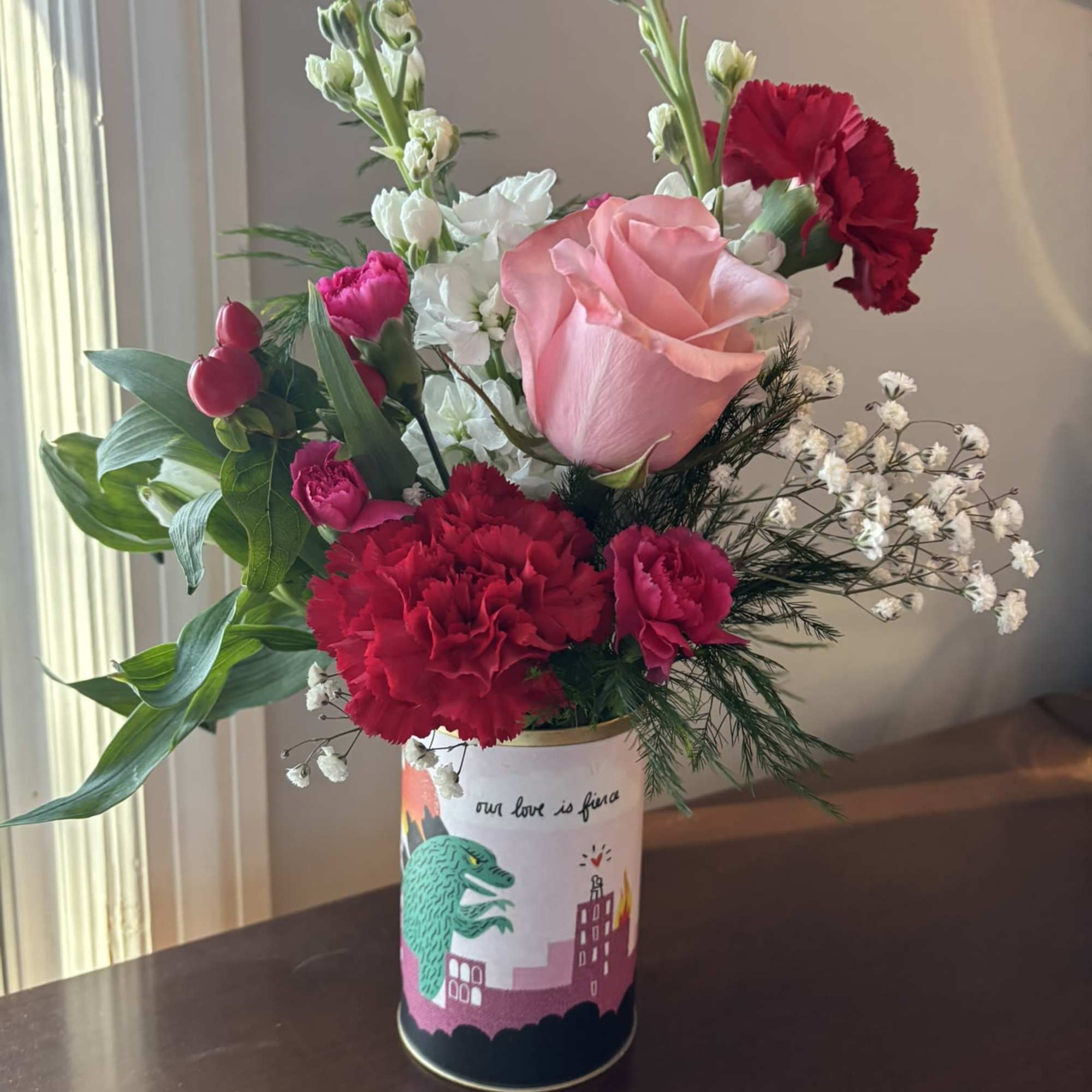 A colorful Valentine arrangement in a vessel that sends a message. 