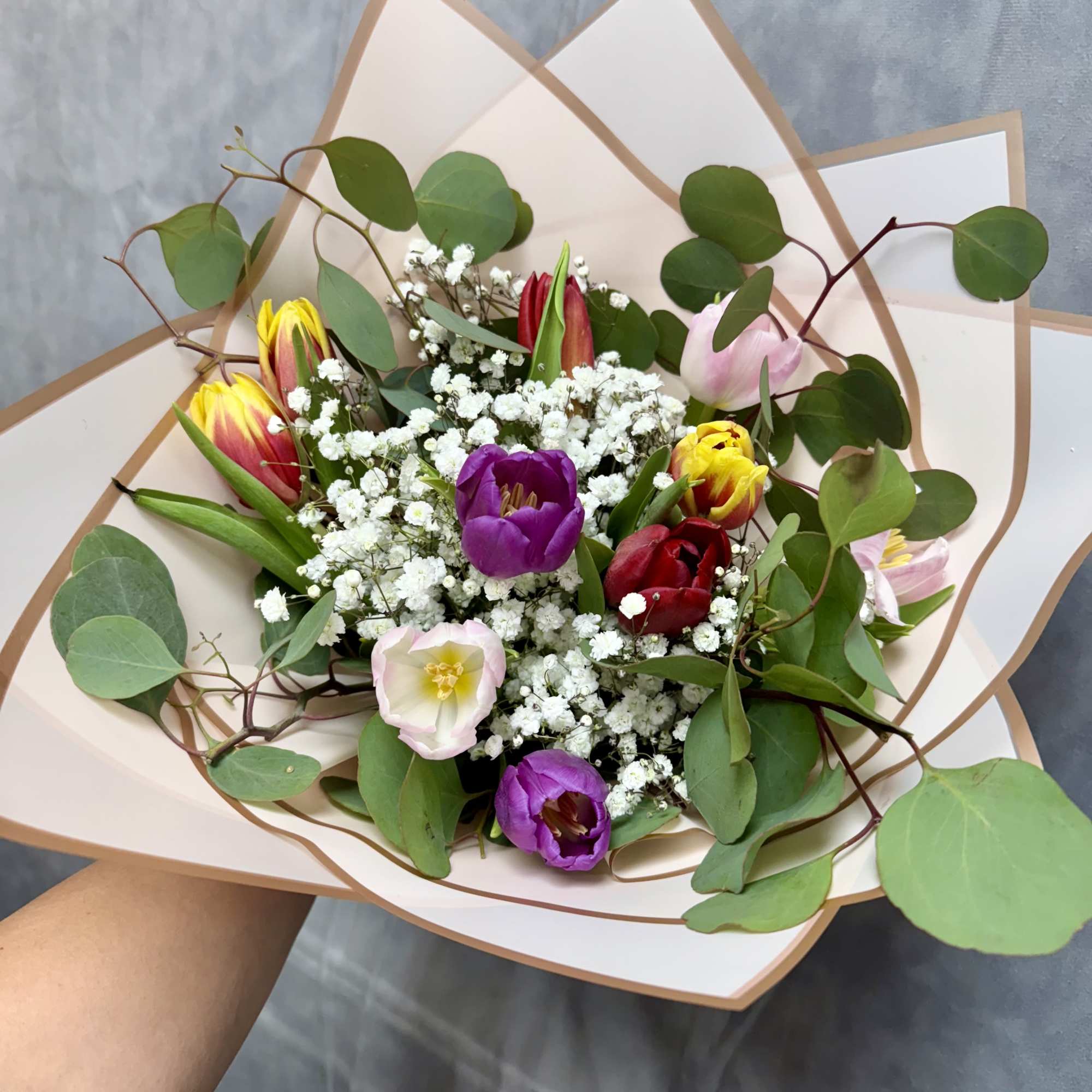 A stunning bouquet of fresh vibrant tulips arranged to bring elegance 