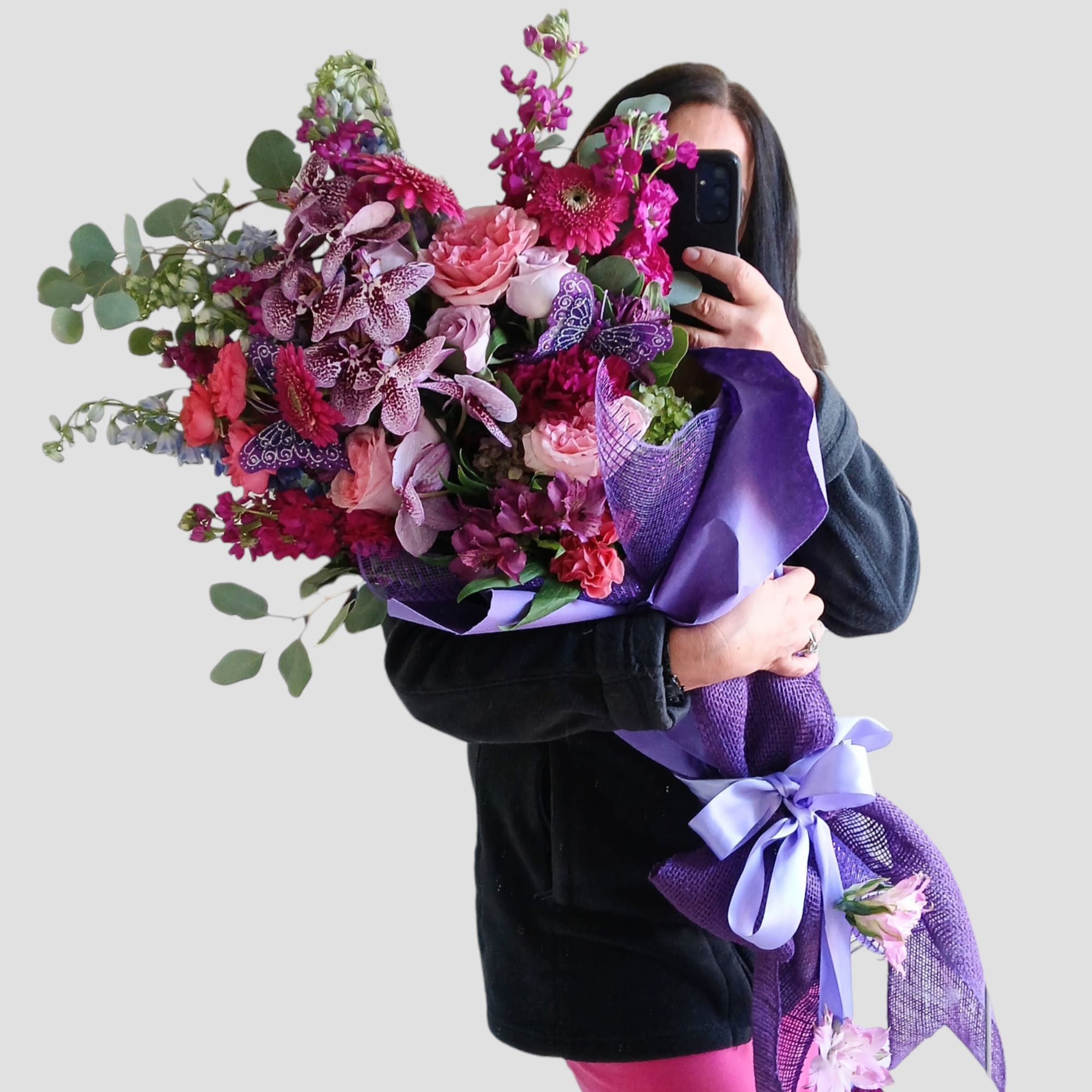 Send this beautiful designer's choice grand purple bouquet today to show them