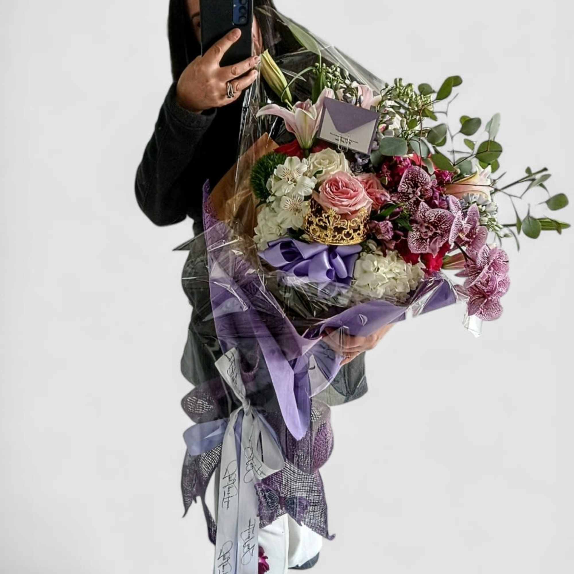 Send this beautiful designer's choice grand purple bouquet today to show them