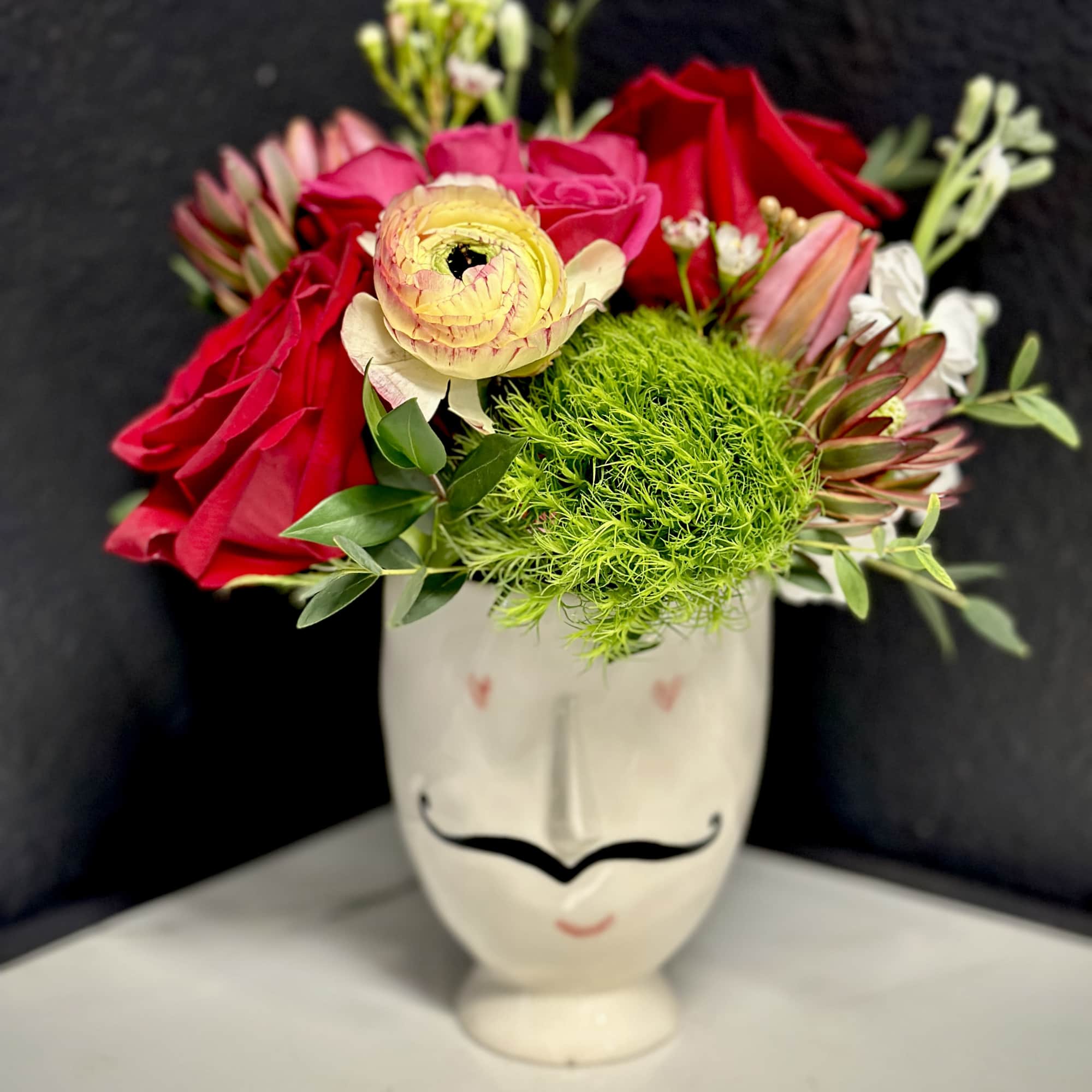 Monsieur Marcel is here to spread some love. This adorable ceramic vase