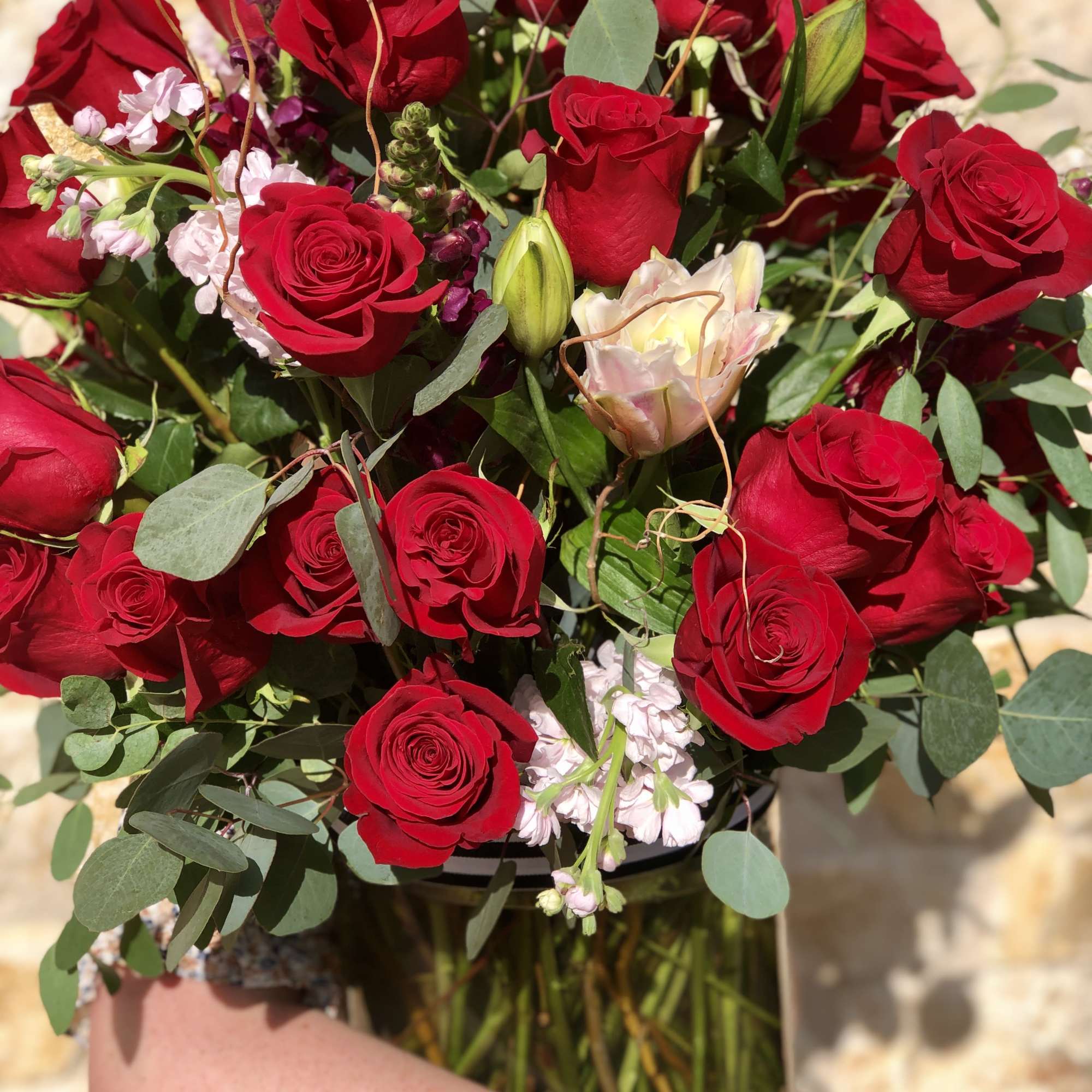 An elegant design that's sure to WOW. A tall arrangement of 40