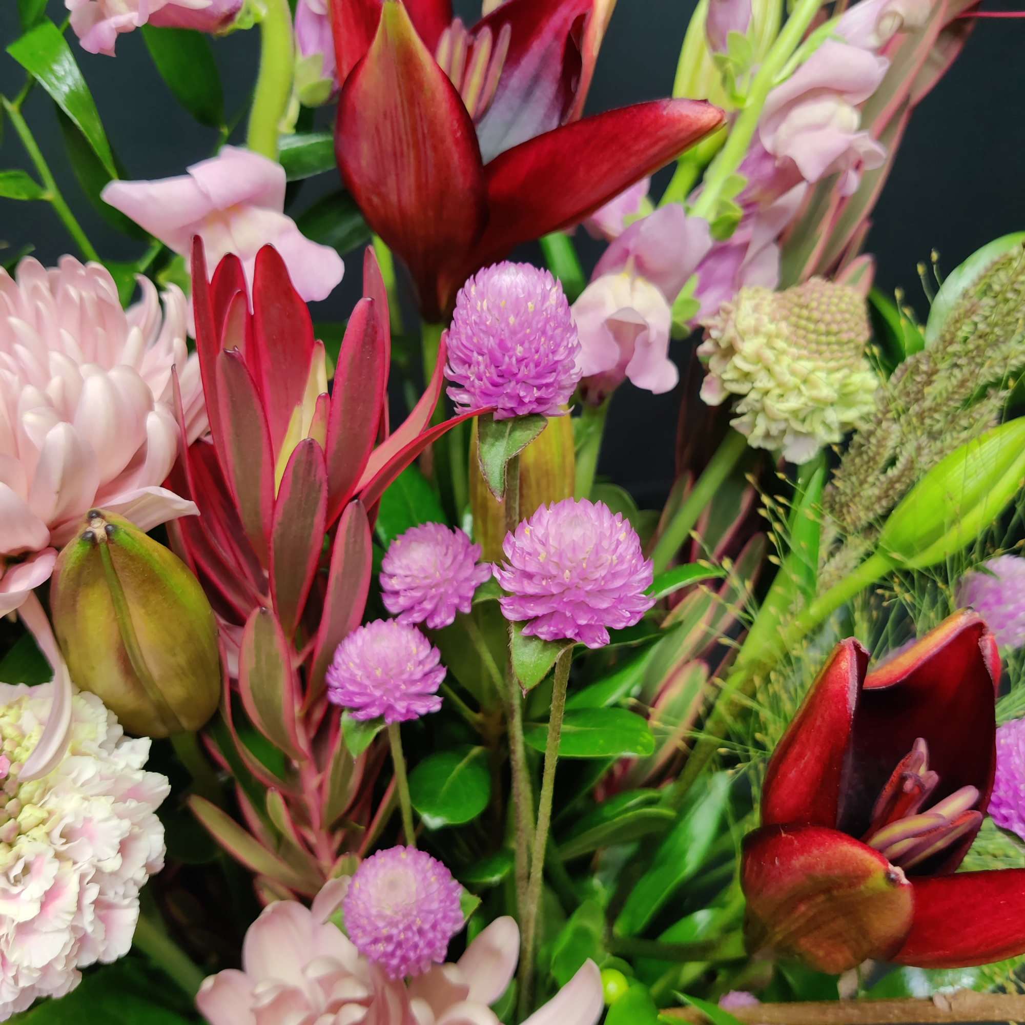 Gorgeous premium Royal lilies, branches and clover will lift your spirits. 