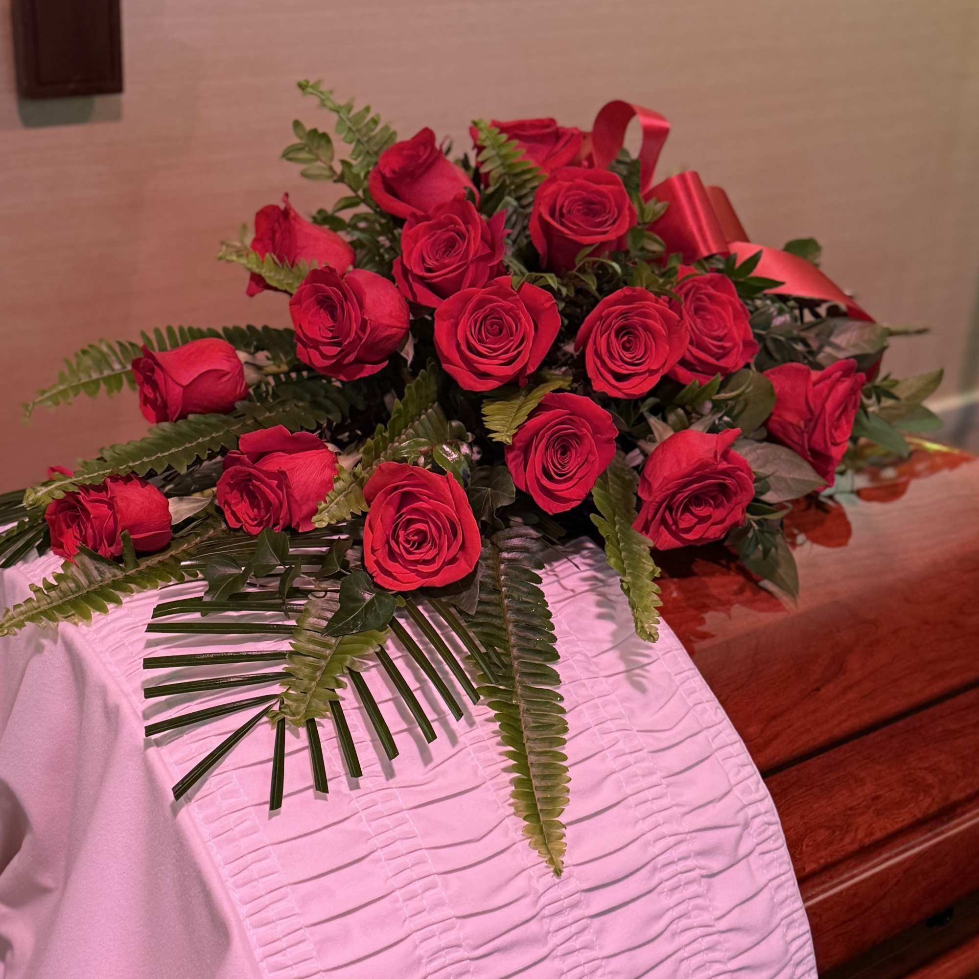 Roses in a pageant bouquet style but built to sit on top