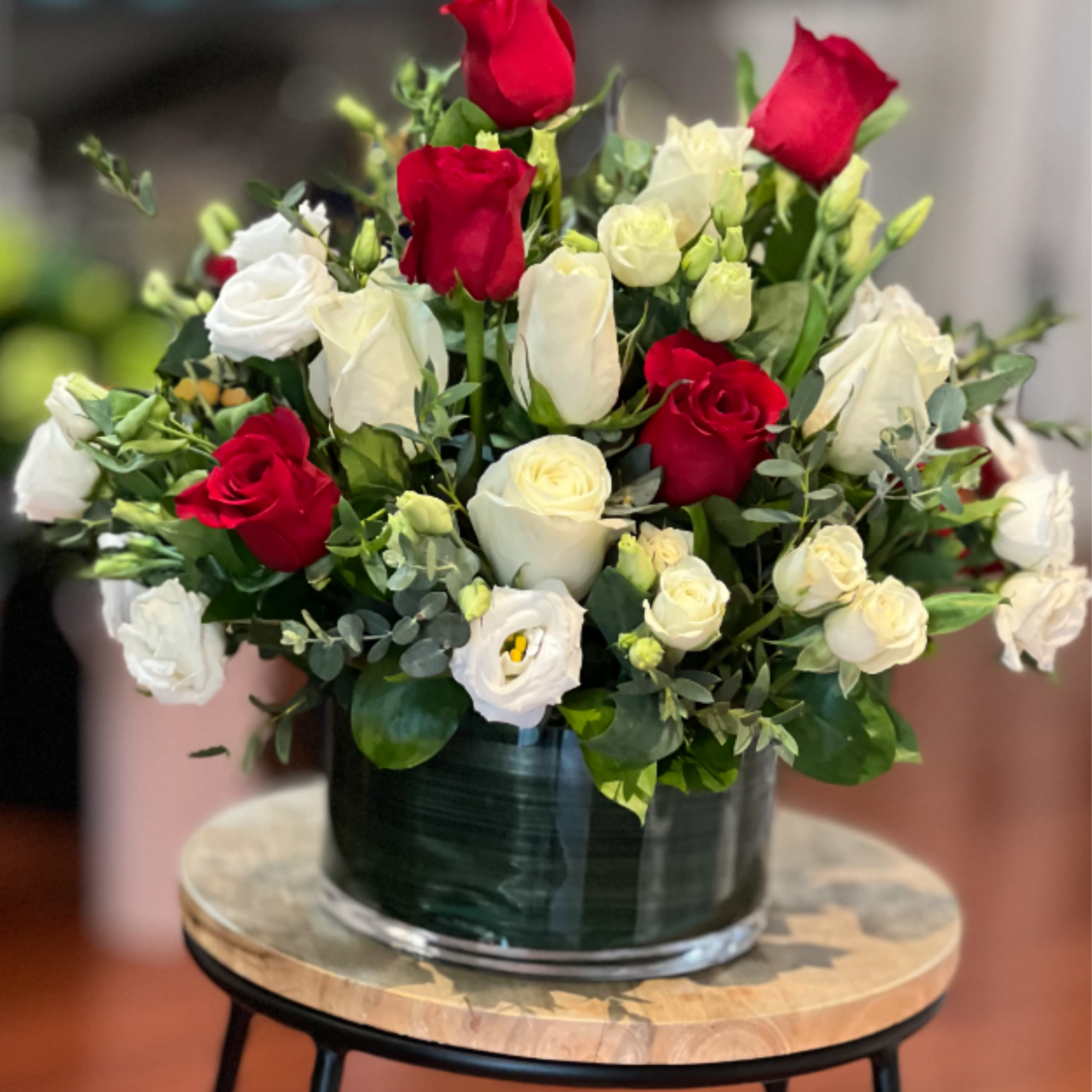 Serenade your love with this beautiful bouquet of red and white roses!