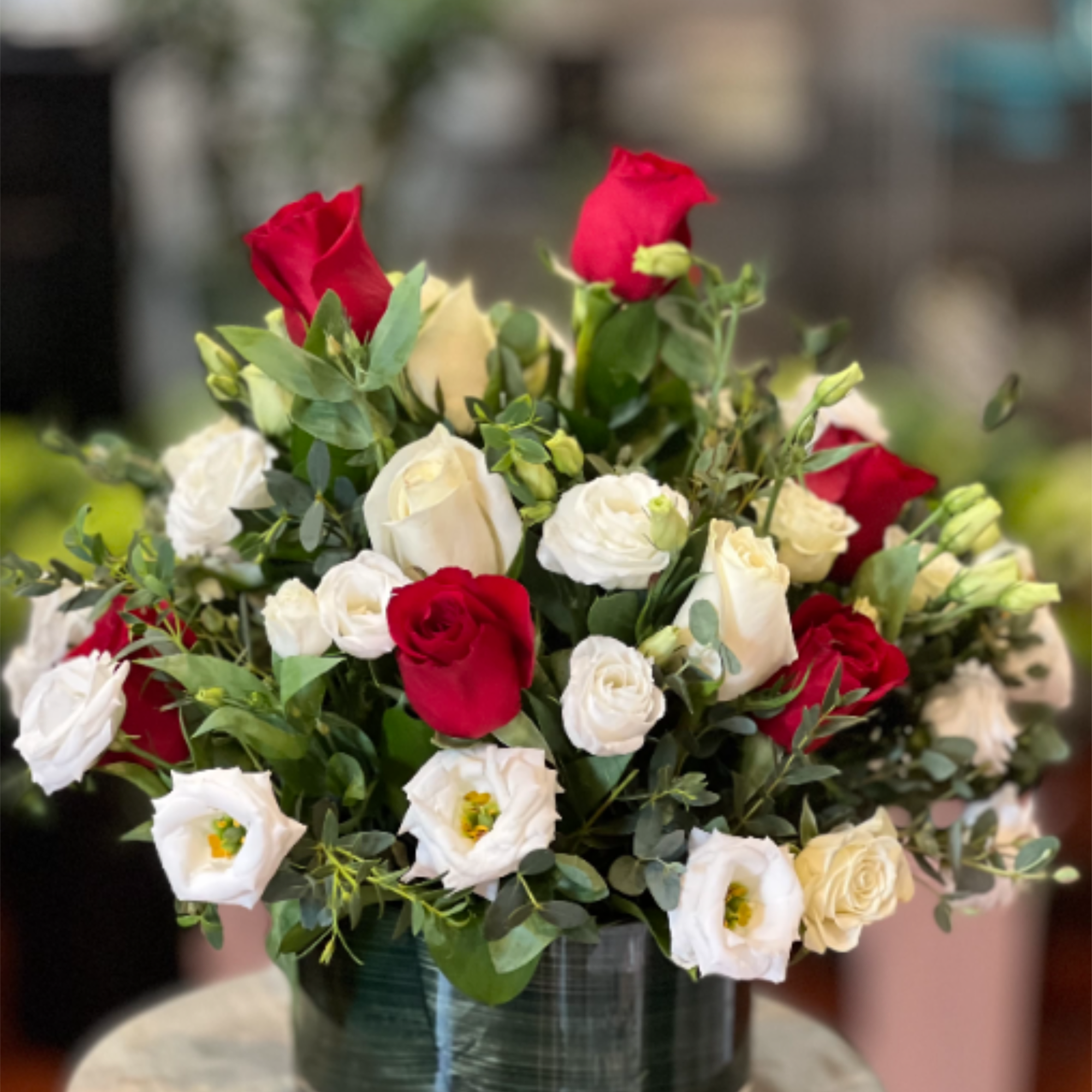 Serenade your love with this beautiful bouquet of red and white roses!