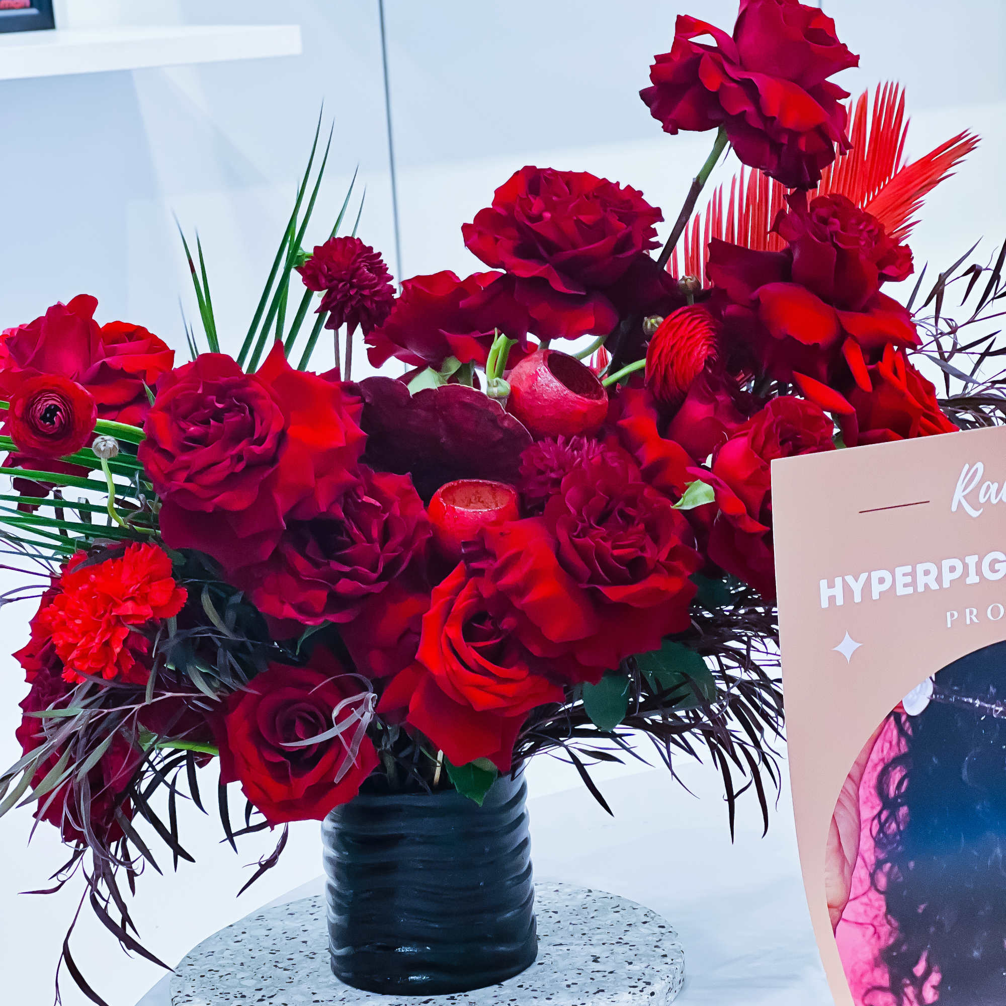 These will be designer choice red roses. The design will be similar