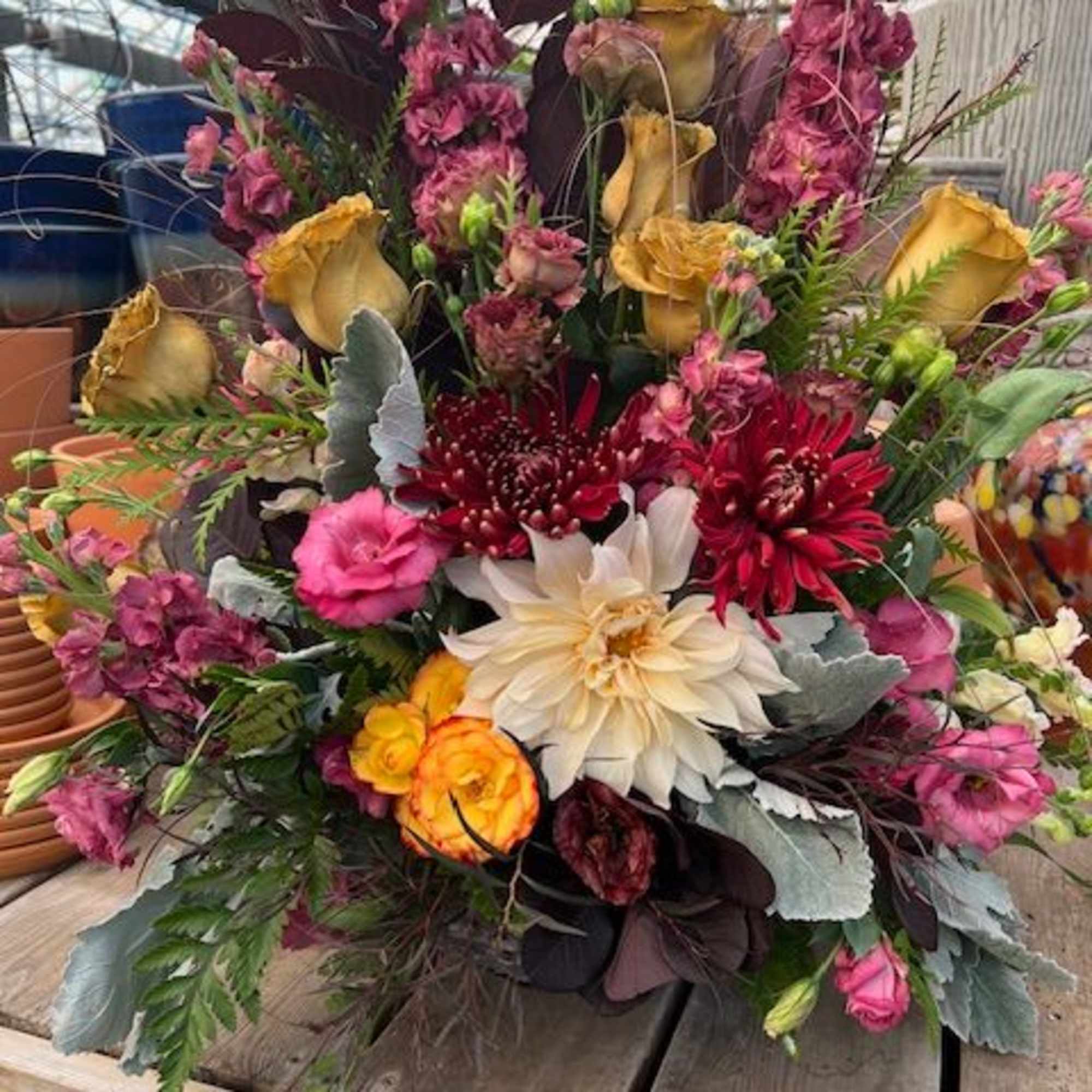 A large arrangement of both mixed blooms and greens. 