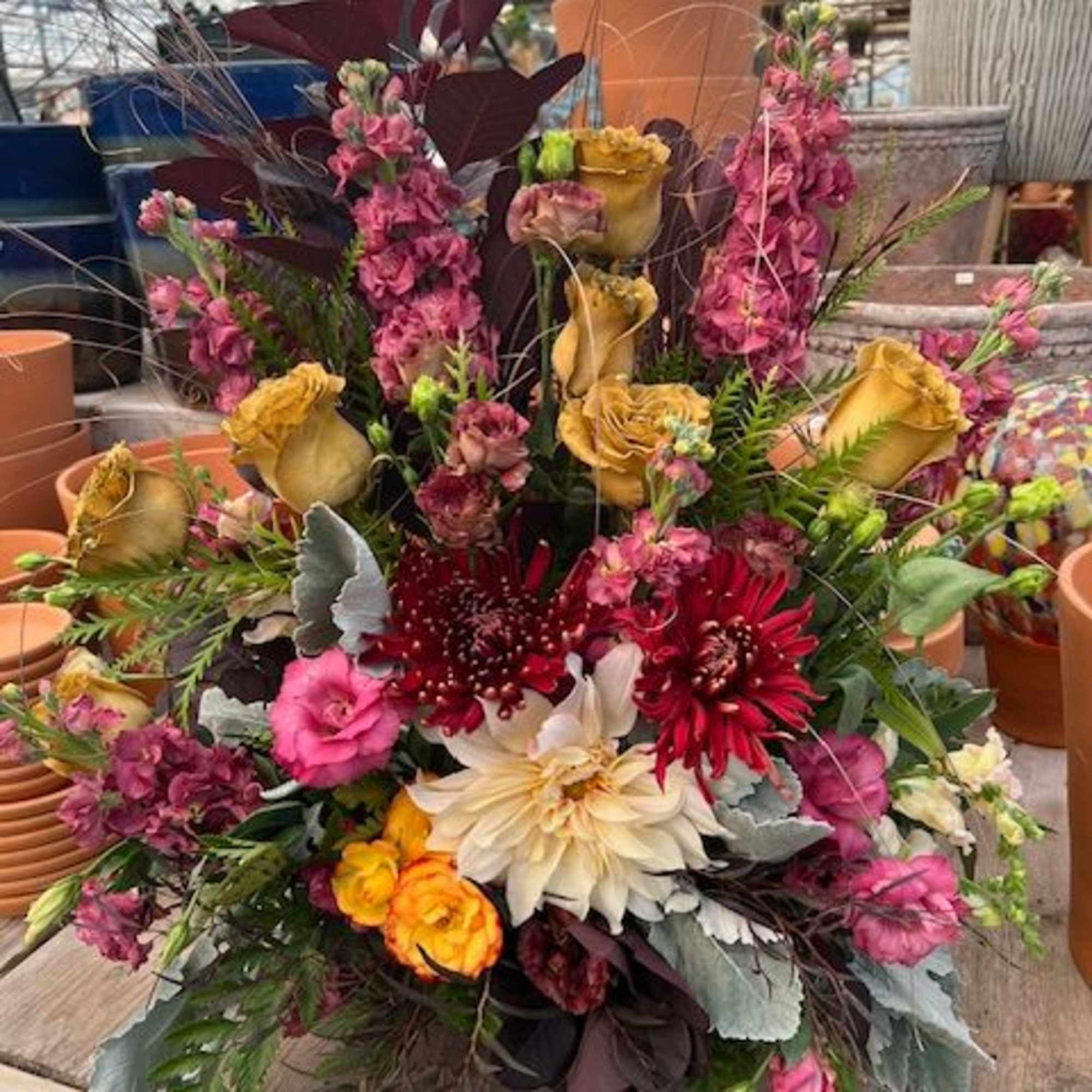 A large arrangement of both mixed blooms and greens. 