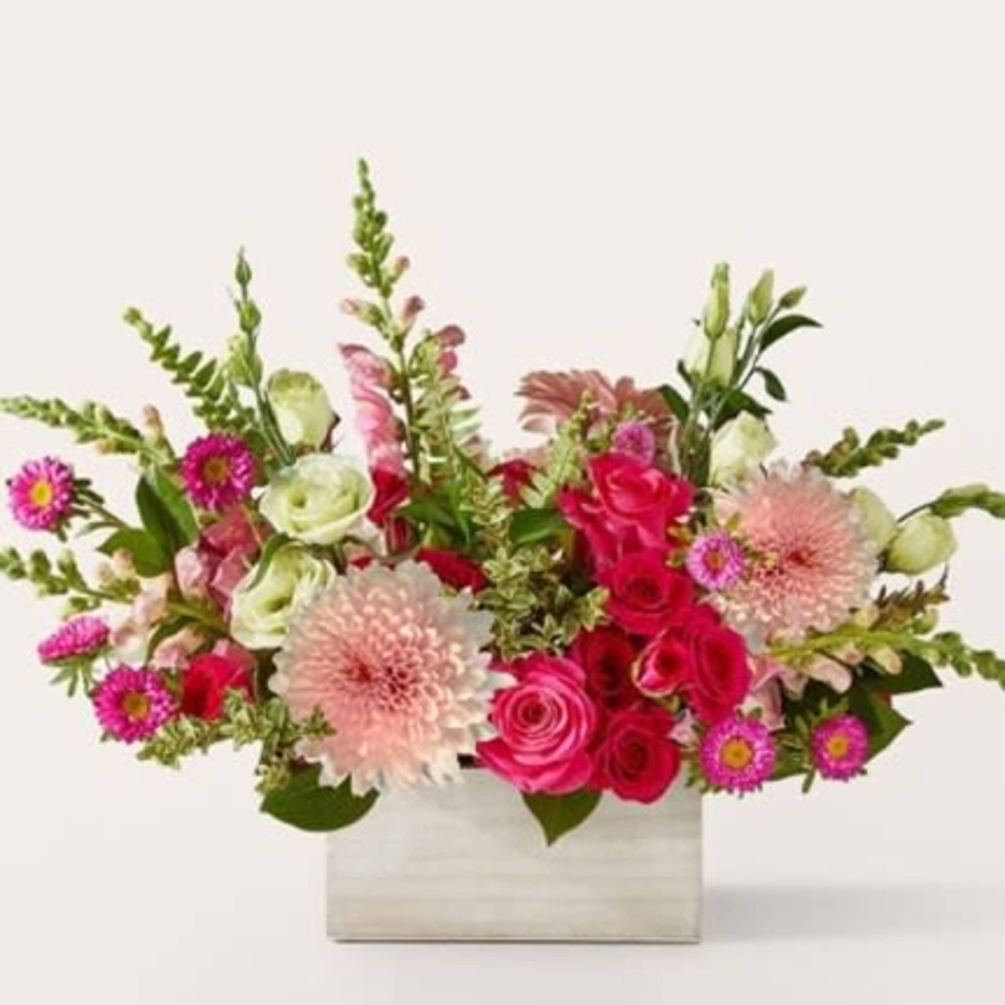 Sweet as can be, this blushing bouquet of pink blooms is an
