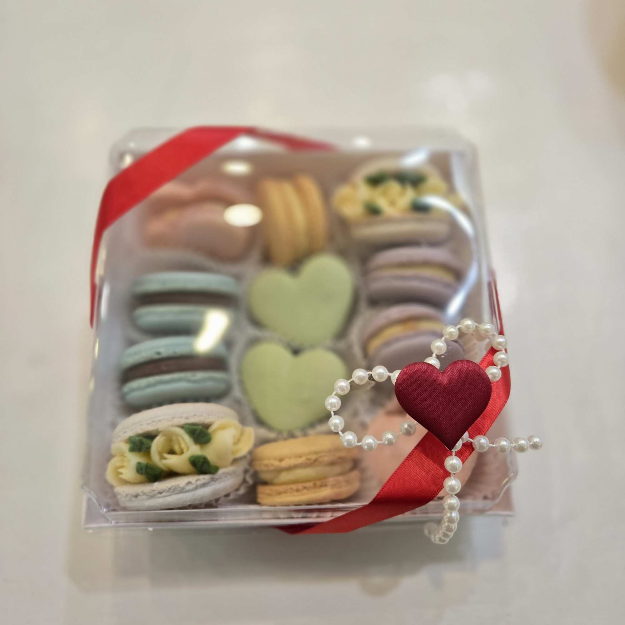 A stylish presentation of handcrafted sweets, designed to complement your floral gift